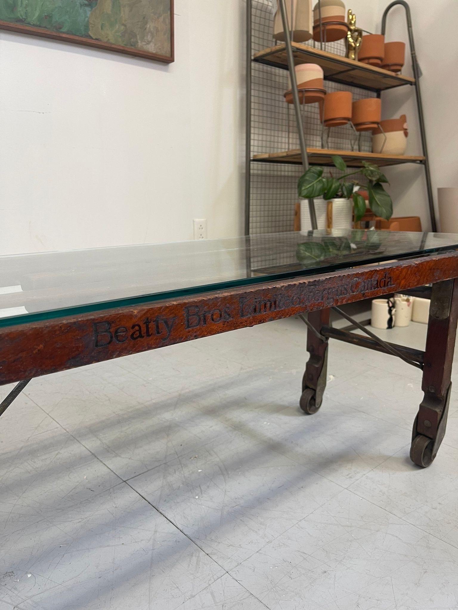 Mid-Century Modern Vintage Reclaimed Wood Coffee Table. Glass Top For Sale