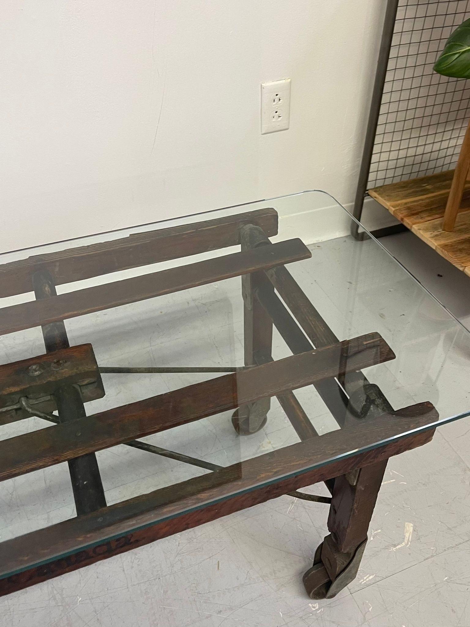 Vintage Reclaimed Wood Coffee Table. Glass Top In Good Condition For Sale In Seattle, WA