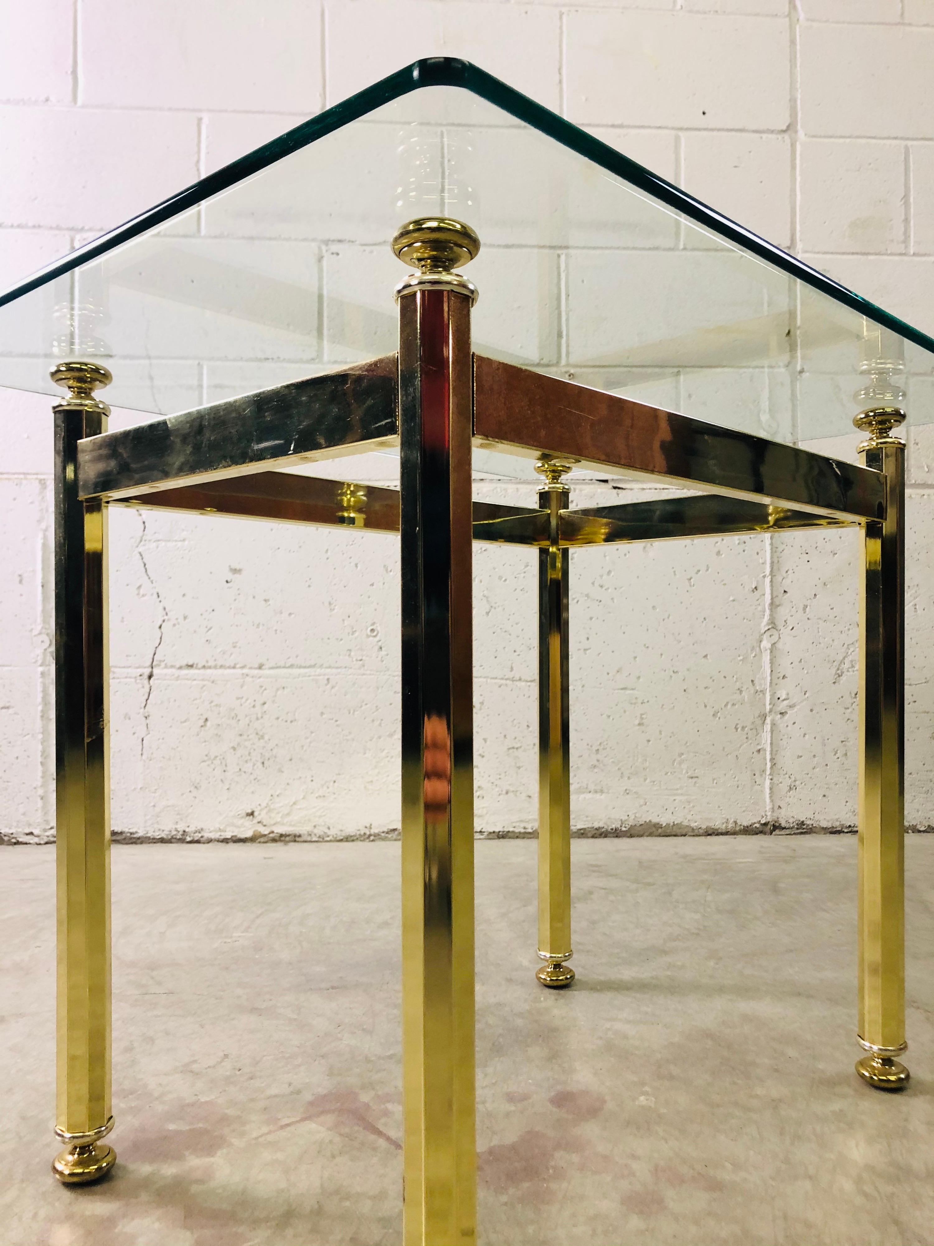 Vintage 1970s rectangular brass and glass top side table. The table is sturdy and the glass has minimal wear. No marks. l.