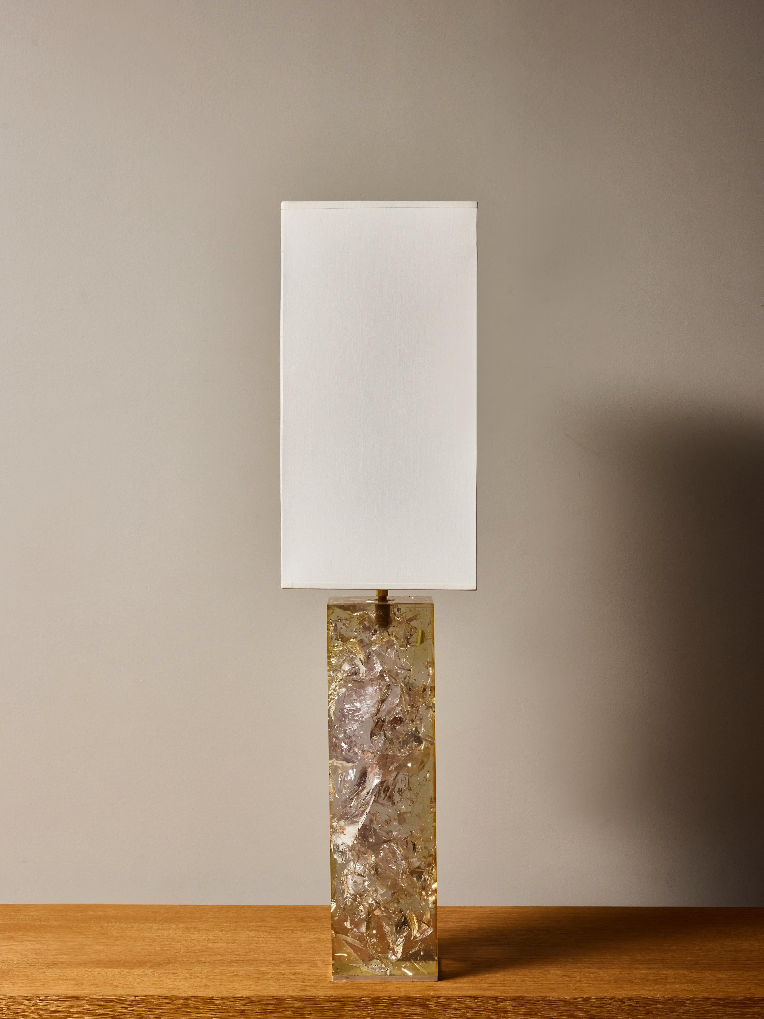 Striking French sculptural table lamp from the 1970s, featuring a tall rectangular base cast in fractal resin, a technique celebrated for its jewel-like depth and dramatic internal reflections. The resin block is filled with shimmering, shard-like