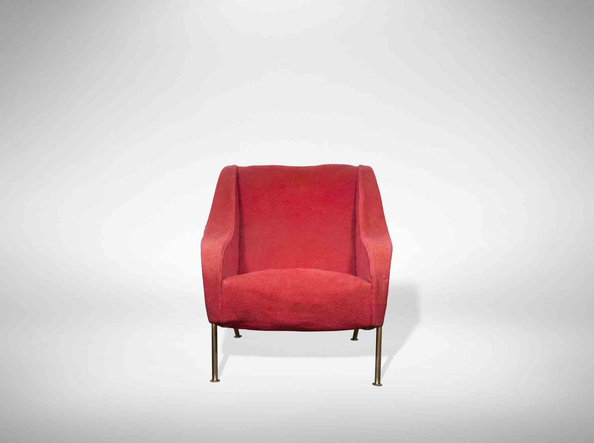 Vintage red armchair is an original design item realized in Italy during 1950s.

Padded wooden structure.

Base with brass tubular.

Unique and innovative design for the time, very comfortable and enveloping.

Dimensions H 75 cm / L 60 cm. /