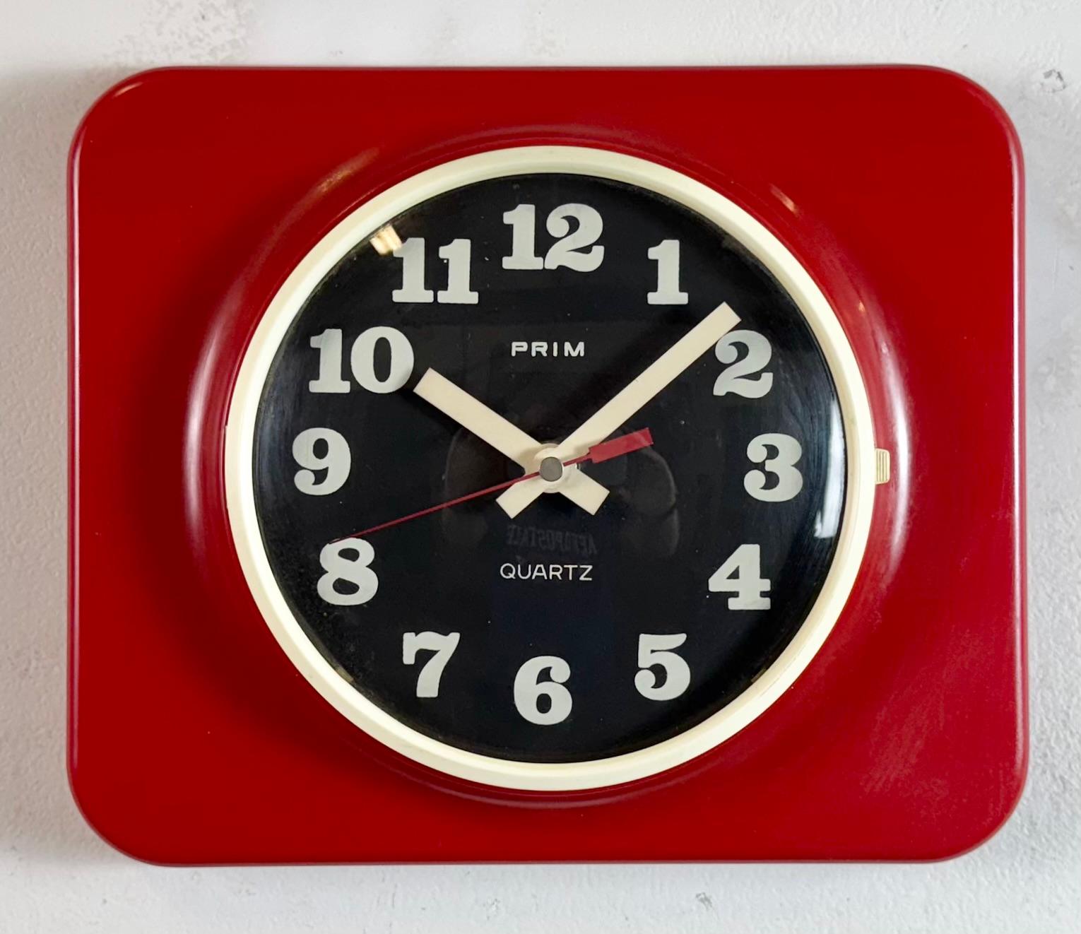Industrial Vintage Red Plastic Wall Clock from Prim, 1970s For Sale
