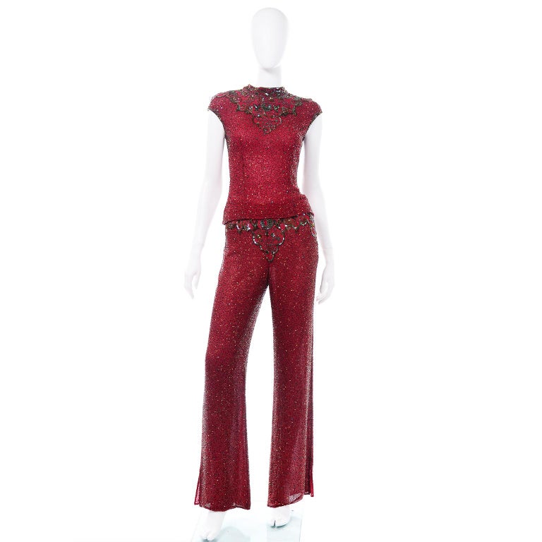 This amazing burgundy red silk beaded outfit is so elegant and we love outfits like these as alternatives to evening dresses! This set is made from an incredible burgundy silk fabric and dark gray beads and thread. The beaded detail is consistent