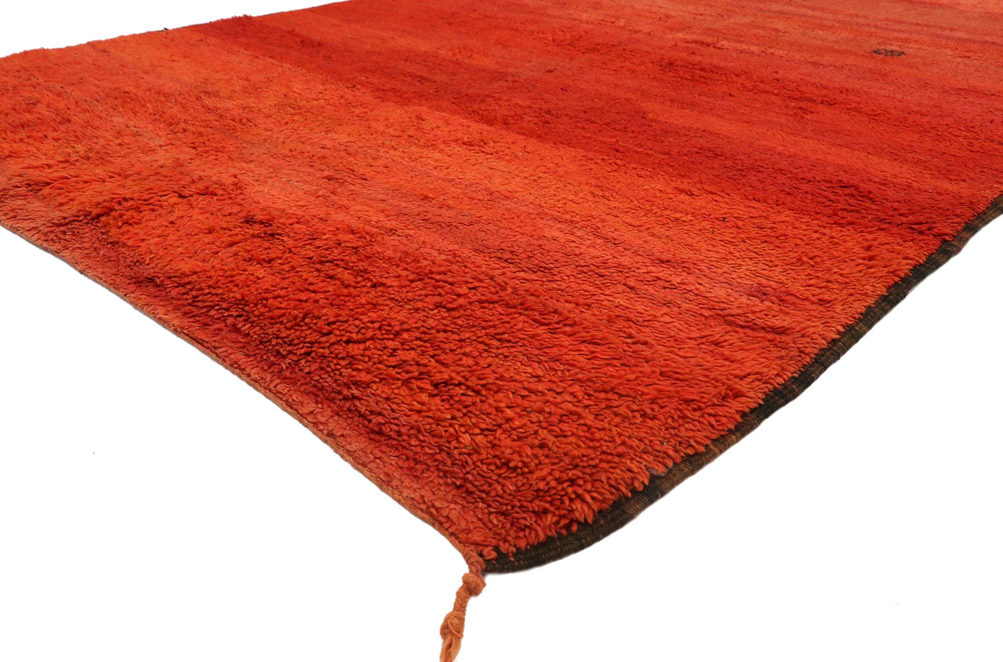 21017 Vintage Red Beni Mrirt Moroccan Rug, 06'11 x 10'08.

This hand-knotted wool vintage Beni Mrirt Moroccan rug—a masterpiece from the Mrirt region in the Middle Atlas Mountains, meticulously crafted by the Beni Mrirt tribe within the expansive