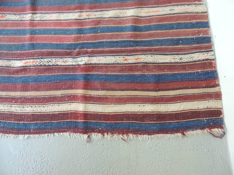 Vintage red - blue - white stripe woven Kilim Area rug.
Red, blue and white stripes. Fraying edges.
Size: 44