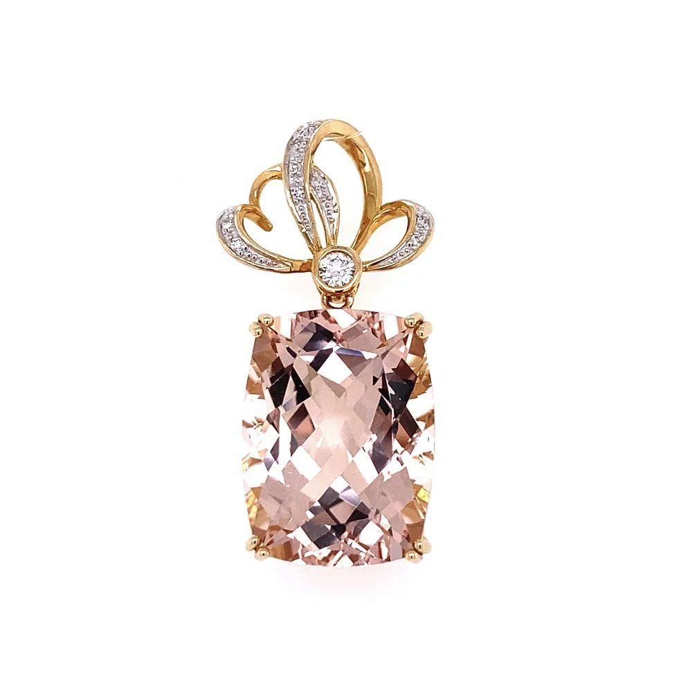 Simply Beautiful! Finely detailed Statement Morganite and Diamond Gold Pendant. Featuring a securely Hand set Morganite, weighing approx. 15 Carats. Enhanced with Diamonds, approx. 0.12tcw. Hand crafted 14K Yellow Gold mounting and measuring 1.4”.