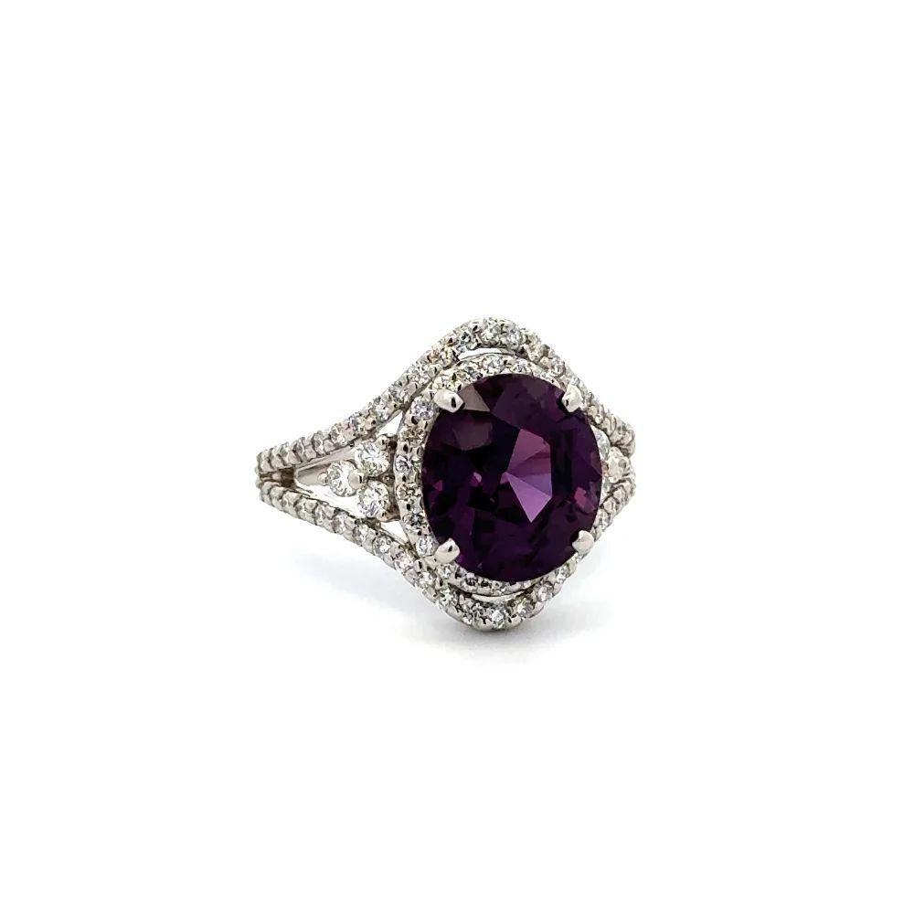 Simply Beautiful! Finely detailed Show Stopper Oval Purple Sapphire and Diamond Statement Platinum Ring. Centering a securely nestled Hand set Oval NO HEAT Purple Sapphire Gemstone GIA, weighing approx. 5.23 Carats. Surrounded by Round Brilliant Cut