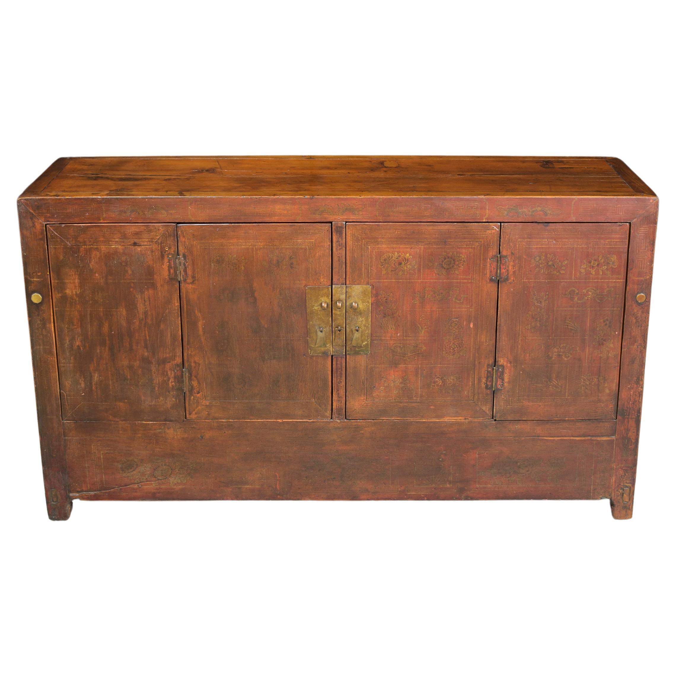 Dive into the elegance of the East with our 1980s vintage Chinese sideboard, immaculately restored and crafted from premium elm wood. This standout cabinet, now in pristine condition, proudly displays a hand-painted floral motif on its front doors,