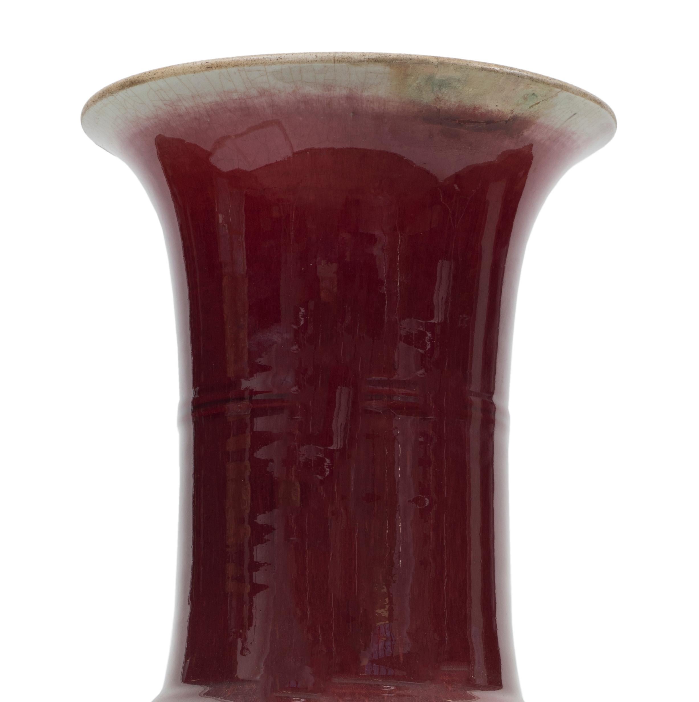 Vintage red ox blood Chinese vase in enameled ceramic with irregular trumpet mouth.
China, Early 20th century.

Good conditions.

This object is shipped from Italy. Under existing legislation, any object in Italy created over 70 years ago by an