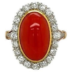 Bague cocktail vintage en platine, corail rouge et diamant