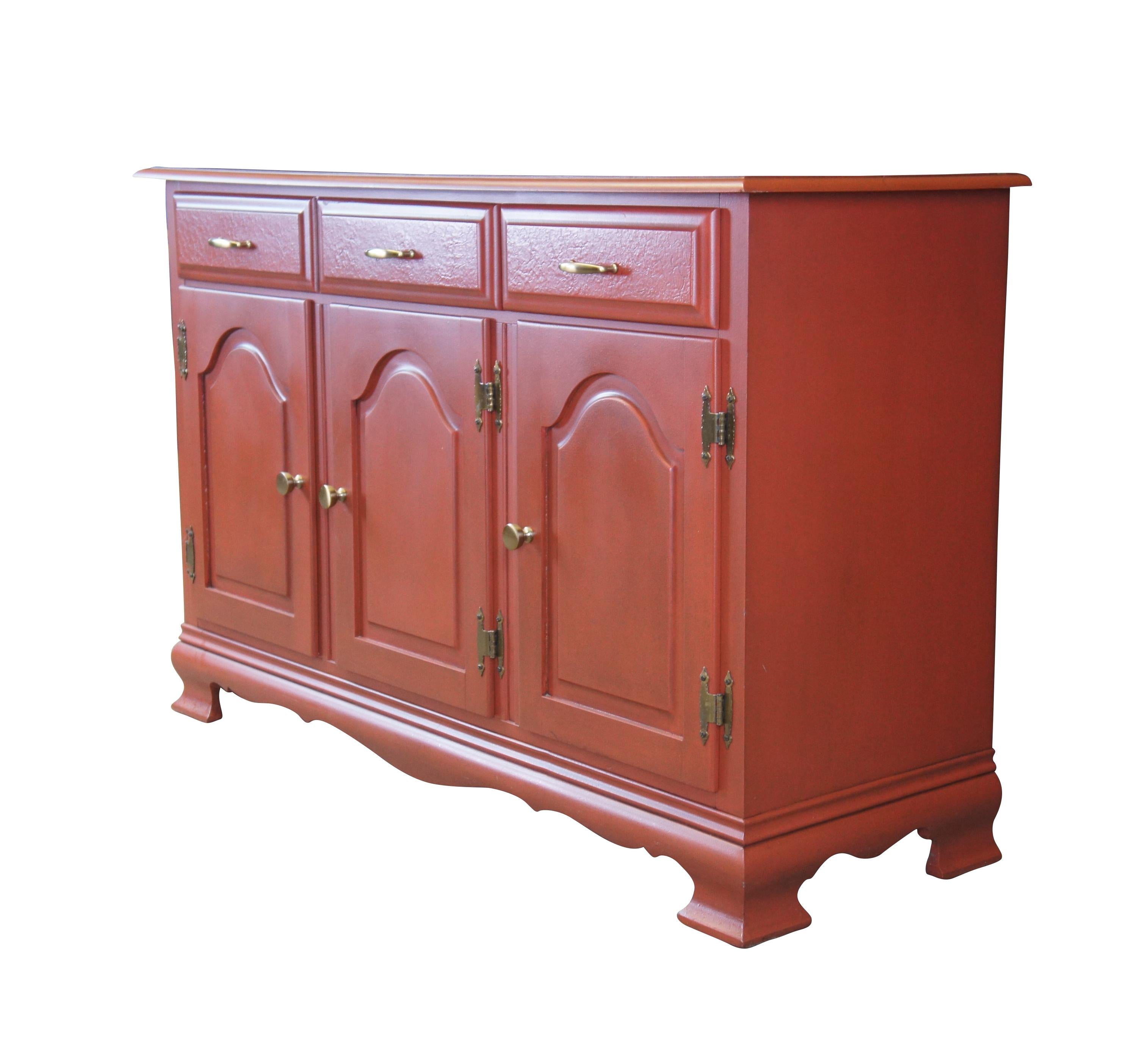 Vintage buffet, sideboard, or console cabinet featuring a red crackle painted exterior with two upper drawers and lower cabinet.