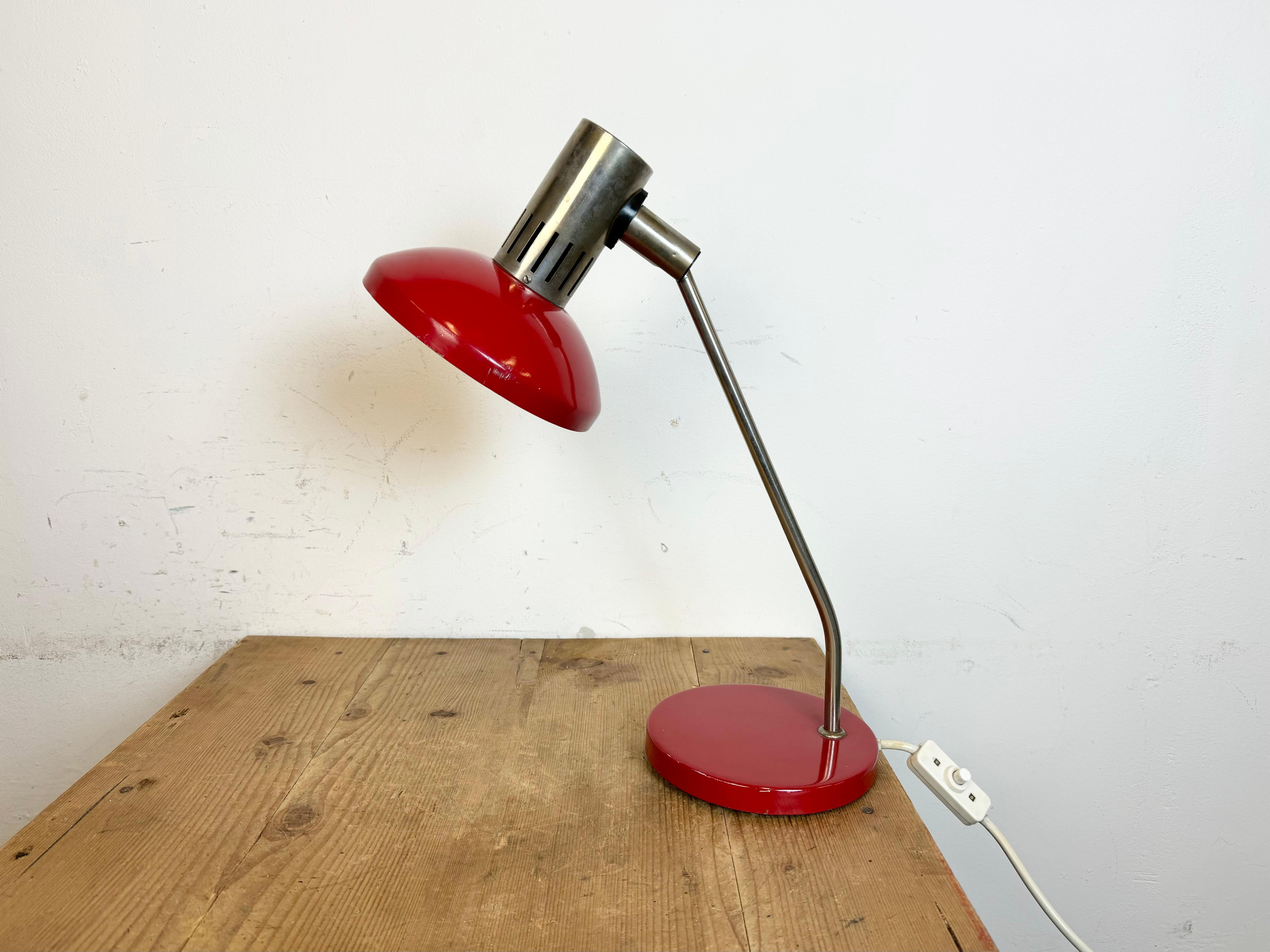 This table lamp was produced by AKA Leuchten in former DDR ( East Germany) during the 1970s. It features an aluminium lampshade, a chrome plated arm and iron base. Fully functional.
Lampshade diameter: 18 cm
Weight : 2.5 kg.