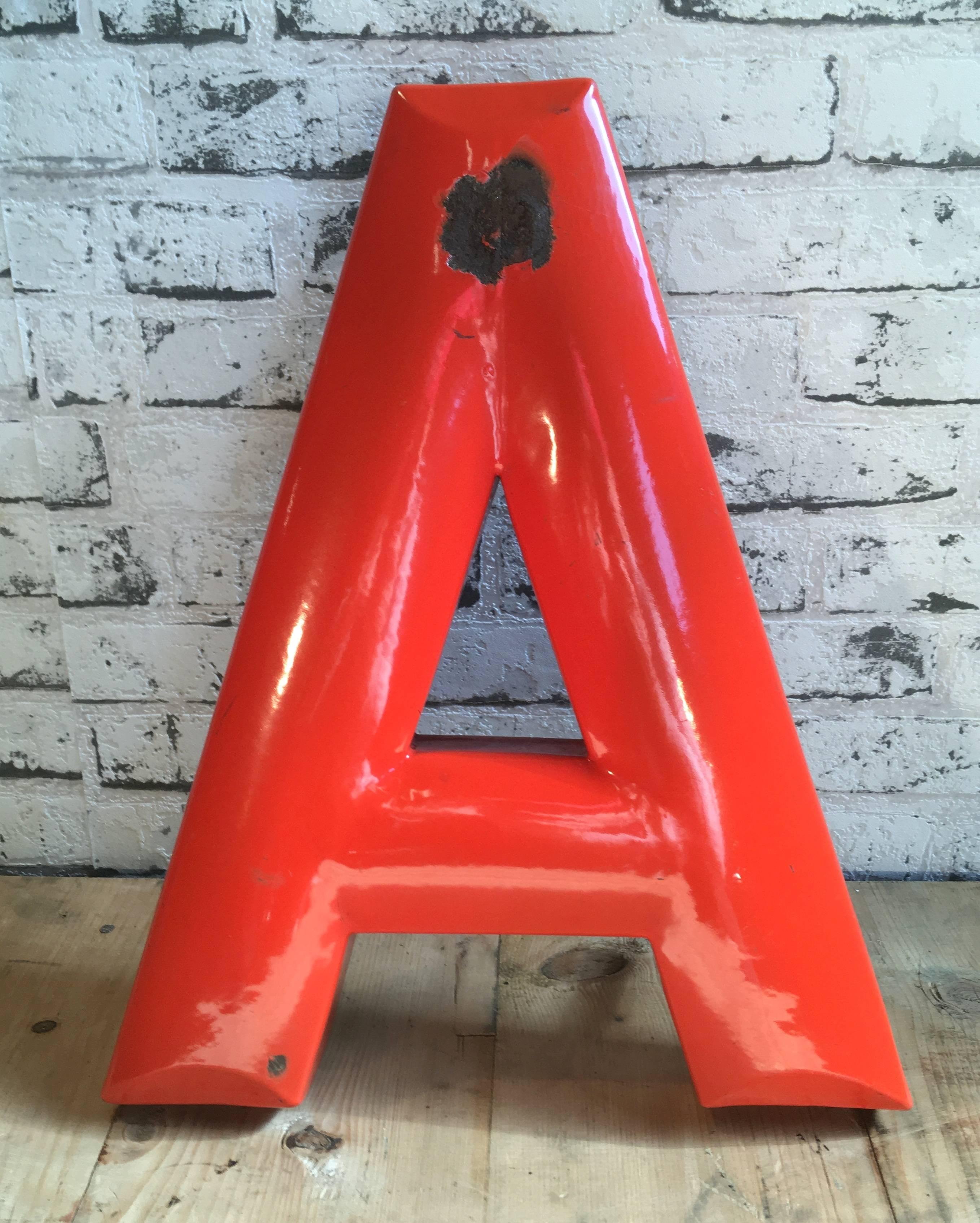 This industrial vintage letter 'A' was manufactured in former Czechoslovakia, 1930s. Comes from an old advertisement.
Letter is made from enamelled iron.
