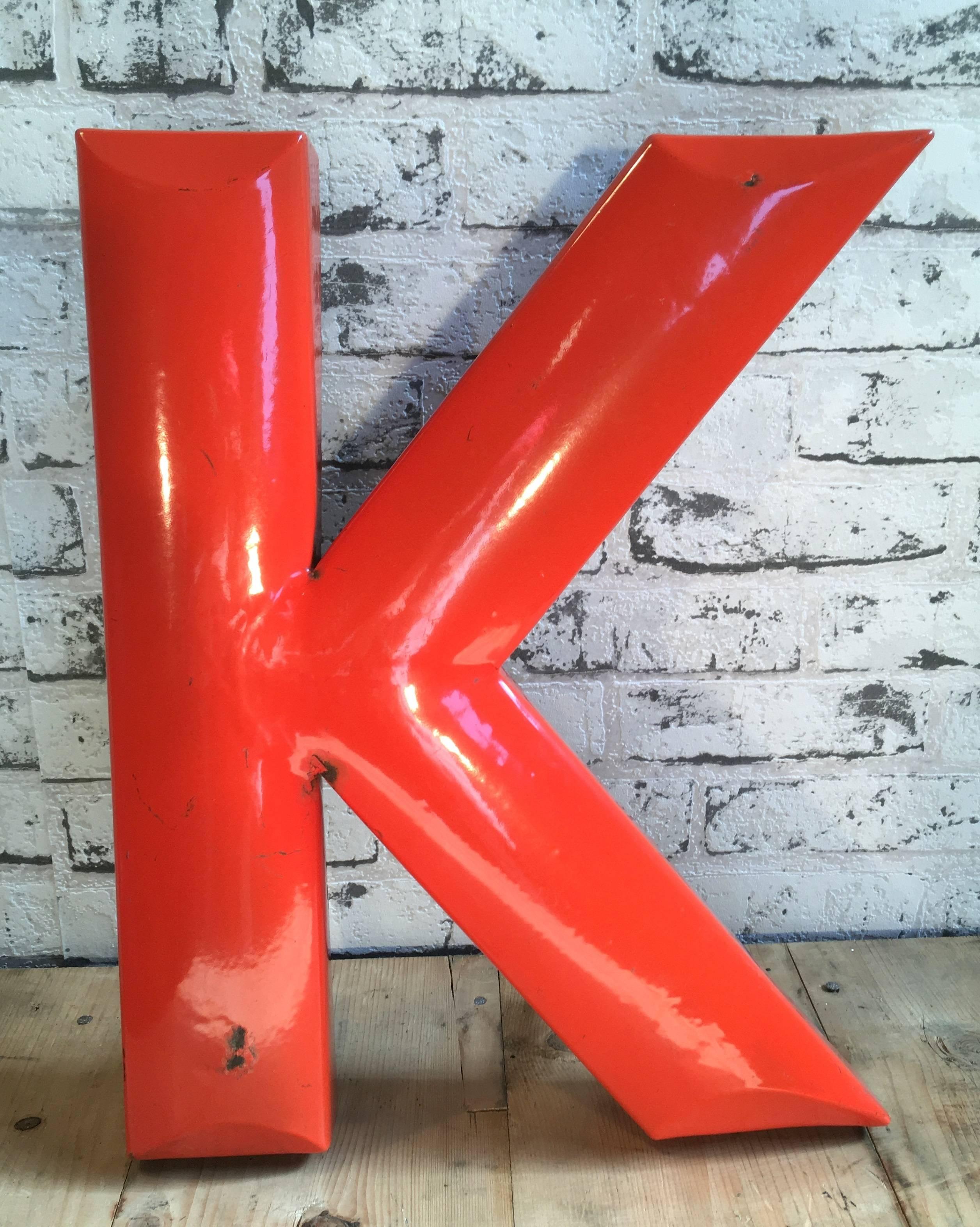 This industrial vintage letter 'K' was manufactured in former Czechoslovakia, 1930s.Comes from an old advertisement.
Letter is made from enameled iron.