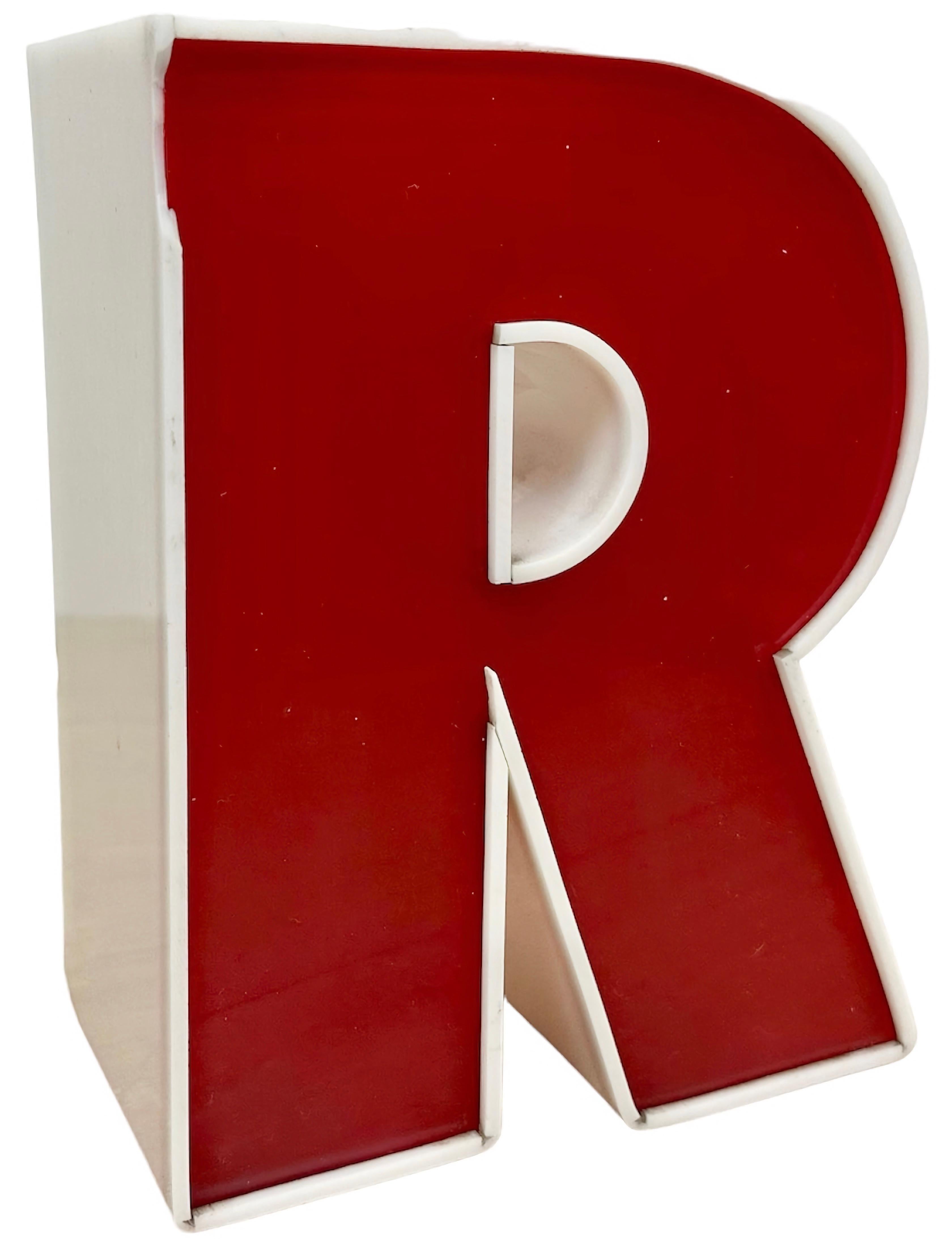 This vintage industrial plastic facade letter R was made in Italy during the 1970s and comes from an old advertising banner “ ROSTICCERIA”. The weight of the letter is 0.5 kg.