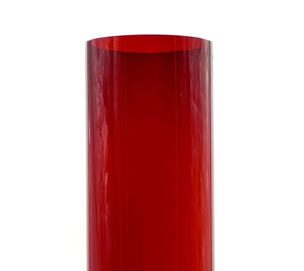 This red glass vase is a decorative object realized in red glass.

Dimensions: cm 49 x 21 x 11.5 (diameter).

In excellent conditions.
