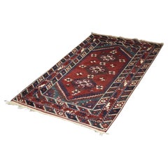 Tapis afghan oriental rouge tissé à la main, années 1970