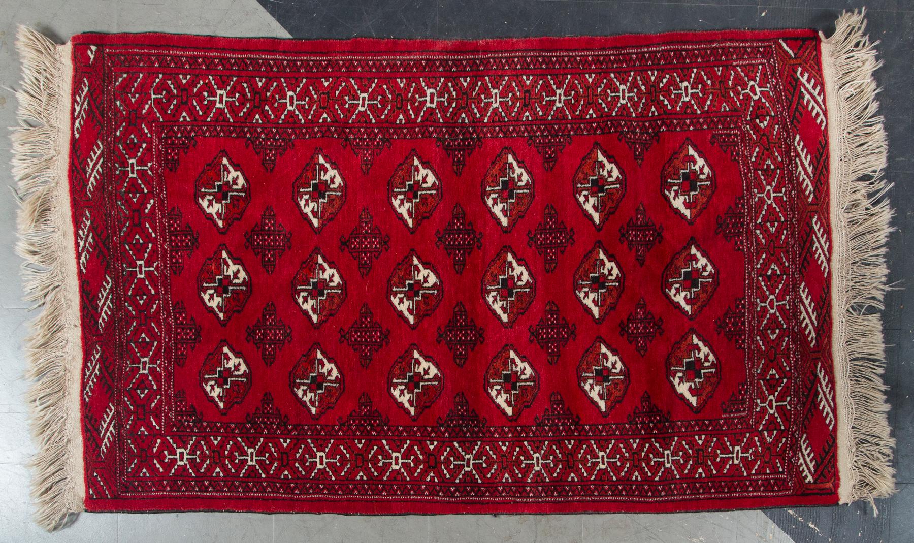 A, circa 1960 original handmade oriental rug never walked. Having all natural organic vegetable dyes (new rugs have synthetic dyes) with lamb’s wool. All original fringes intact rich red color and iconic geometric design in mint condition.
 