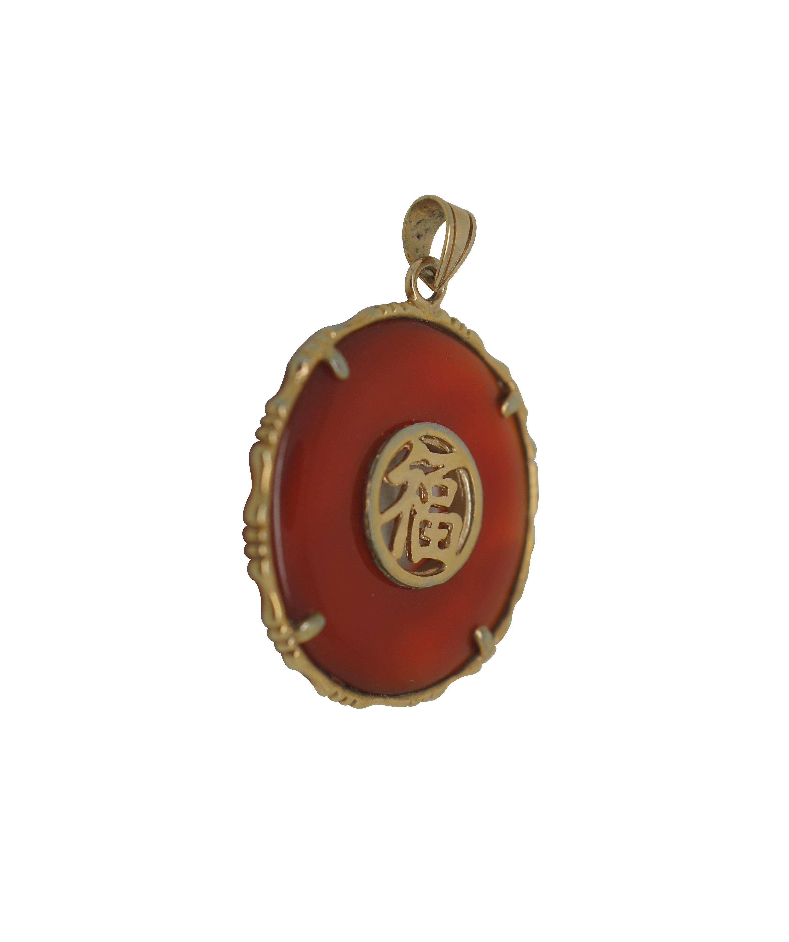 Vintage red jade and gold Chinese Fu symbol (Good Luck, Fortune) medallion disk necklace pendant.

Dimensions:
1.125