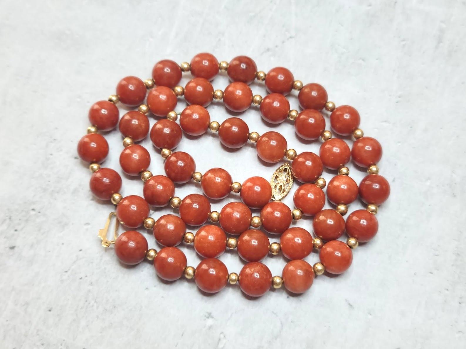 From an estate collection. Extremely Rare! Natural red jade beads are very rare and hard to come by.

The jade beads on this necklace are undyed natural red jades of excellent quality. The jade has a vivid, rusty, saturated color throughout its