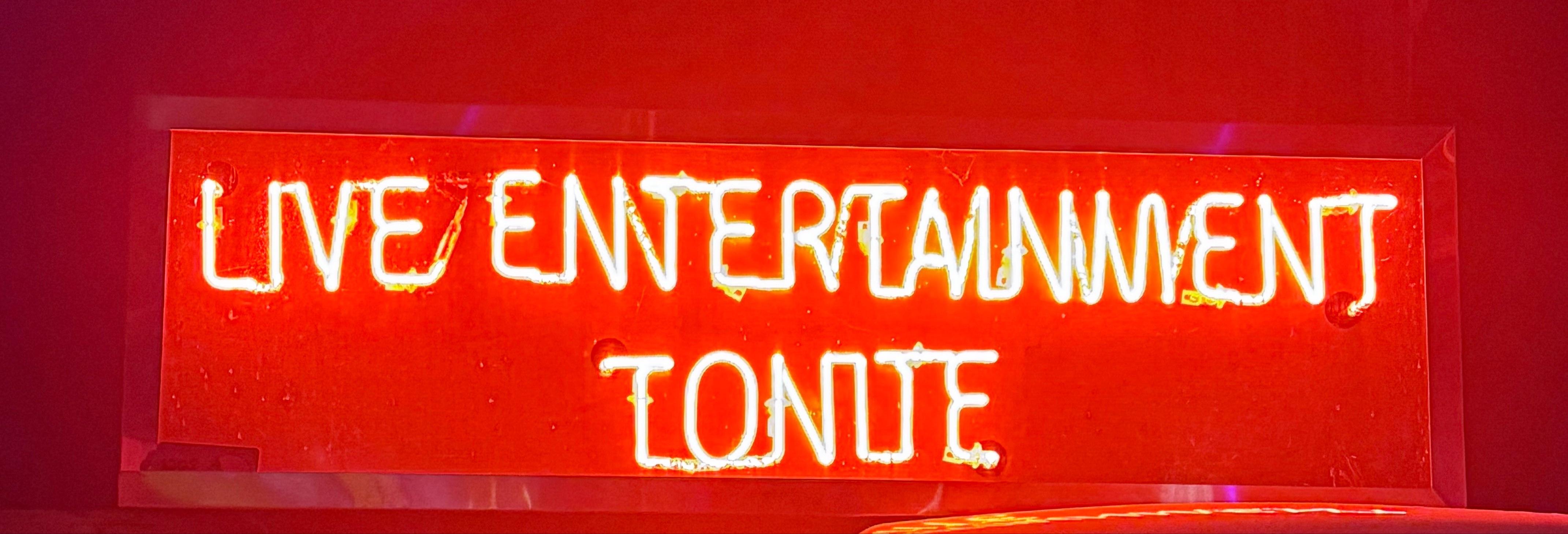 Vintage Red Live Entertainment Tonight Neon Sign

This sign had 