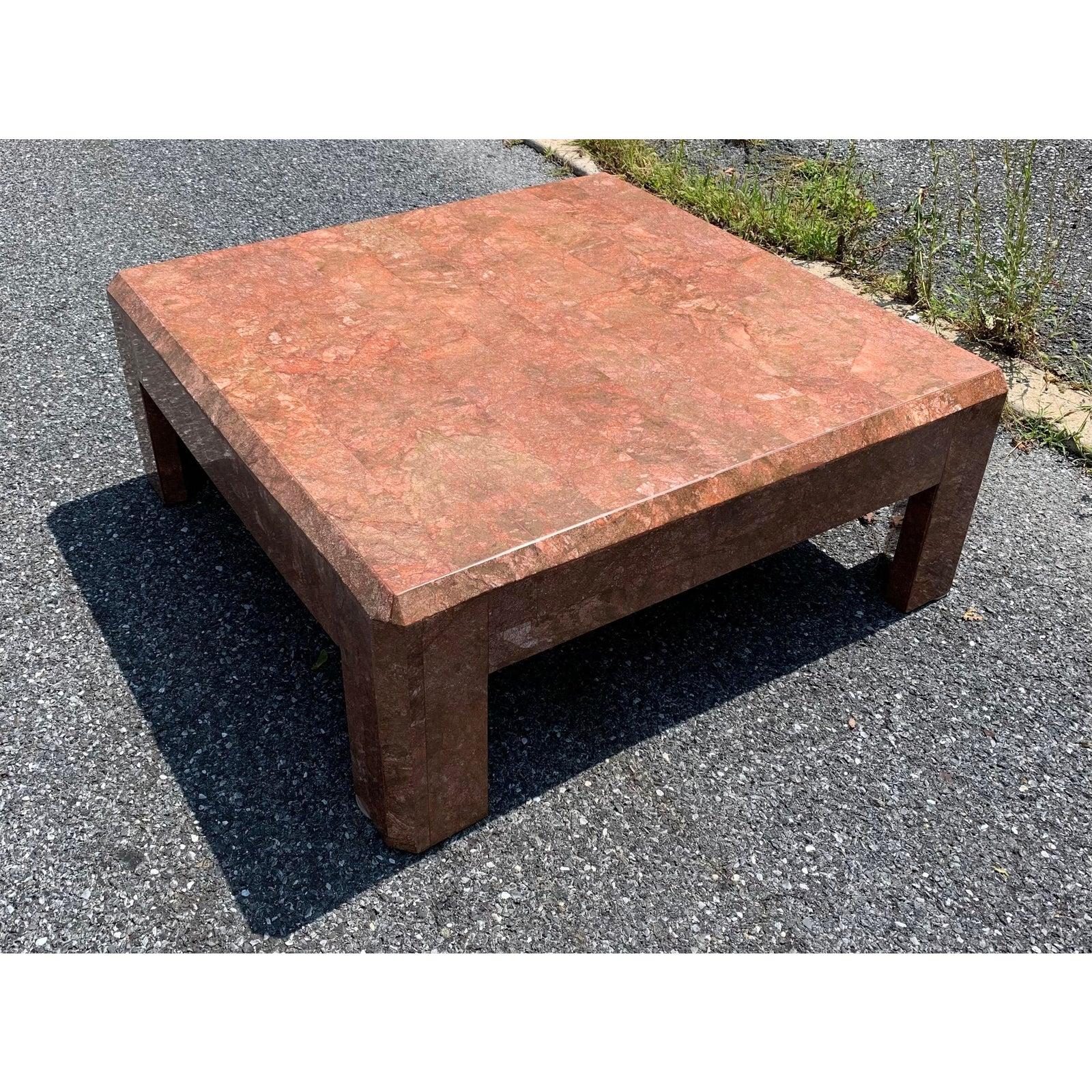 Stunning red marble cocktail table made in the 1970s. 

Beautiful high-quality marble with lovely details.

This table is in pristine condition, with no flaws to note.
