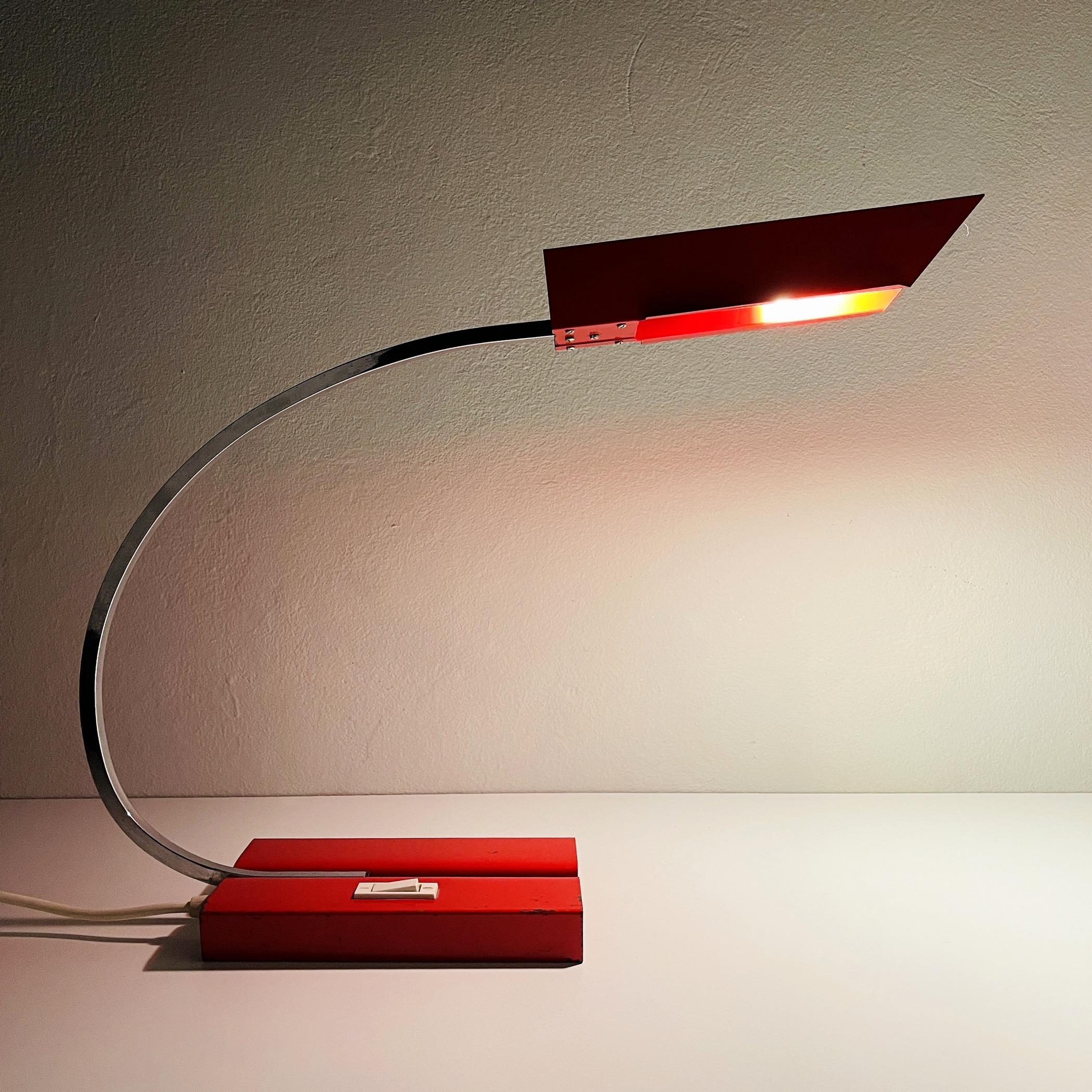 Mid-century rare red metal desk lamp by Emi Poljcane was made in Yugoslavia in the 1970s.
The vintage desk lamp is made entirely of metal, the paint is original. The metal has a natural patina, traces of use and time. All this is clearly visible in