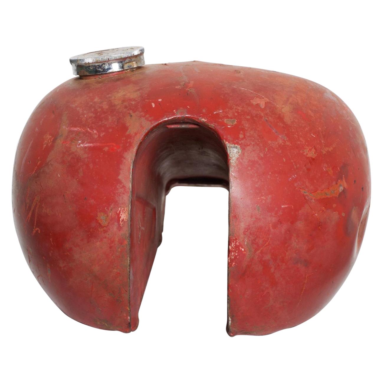 For your enjoyment: Distressed vintage motorcycle gas tank in fabulous red
Has seen a lot of use and wear--super cool weathered and worn appearance.
Ideal for man cave decor.
Unmarked.
Dimensions are: 21 L x 12 W x 10 H
Original unrestored