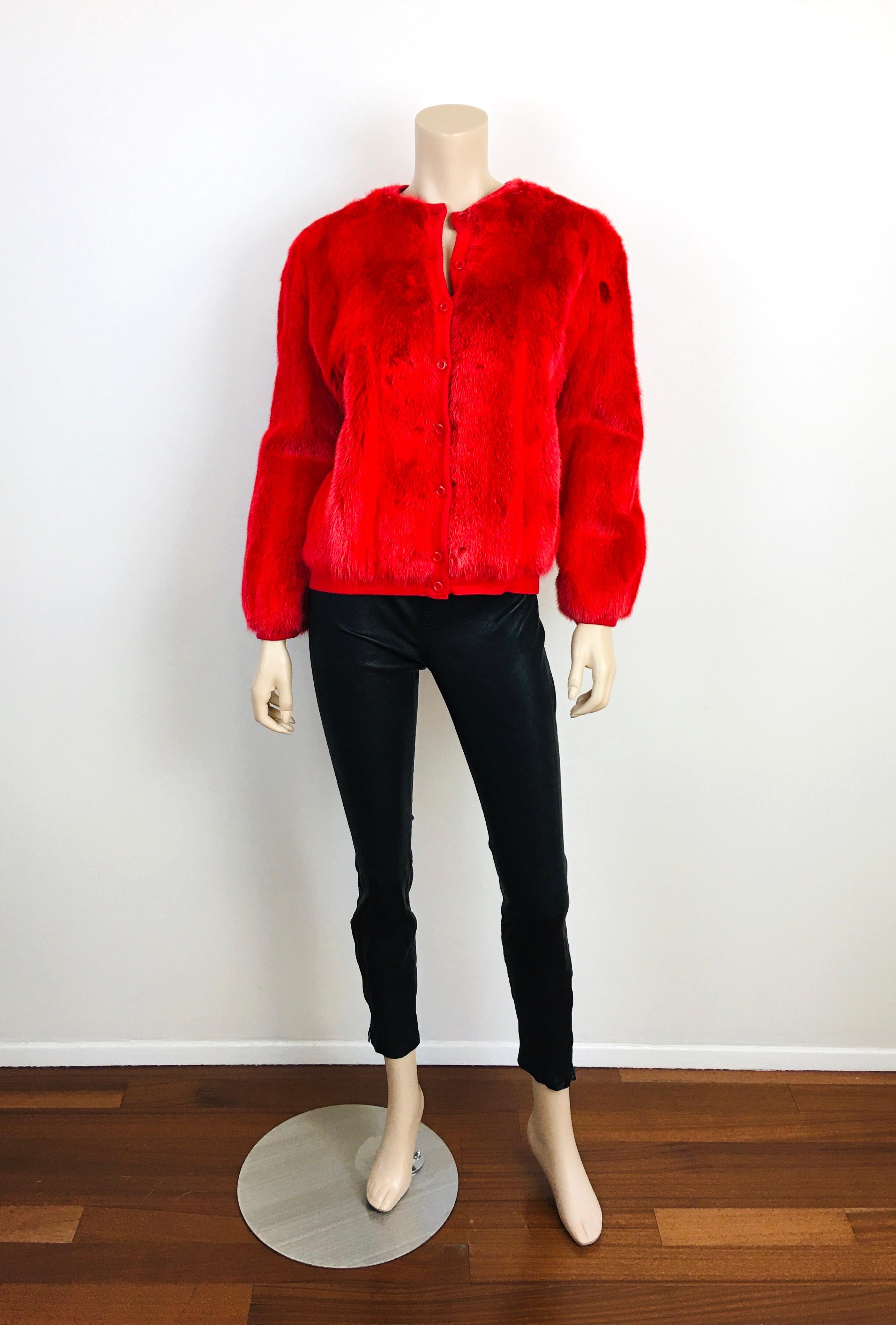 Vintage Red Mink Fur Bomber Style Sweater Jacket.
Buttons at front. 
Hidden pockets.
Loose fit bomber style.
bright red mink fur with sweater knit trim, lined 
By Evans.
Appx size - S / M
21