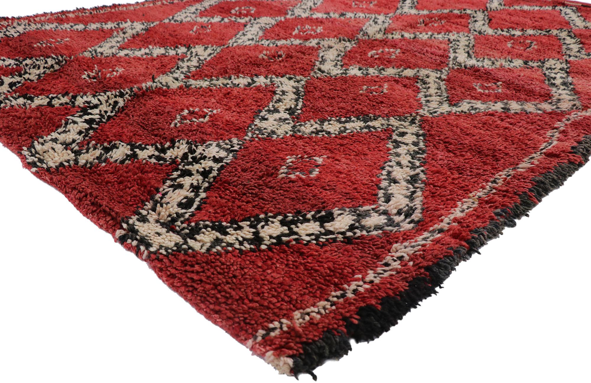 21262 Vintage Moroccan Beni Ourain Rug, 06'06 x 09'00. Cohesive coziness meets boho luxe in this hand-knotted wool vintage Moroccan Beni Ourain rug. The intrinsic tribal design and classic colors woven into this piece work together to creating a