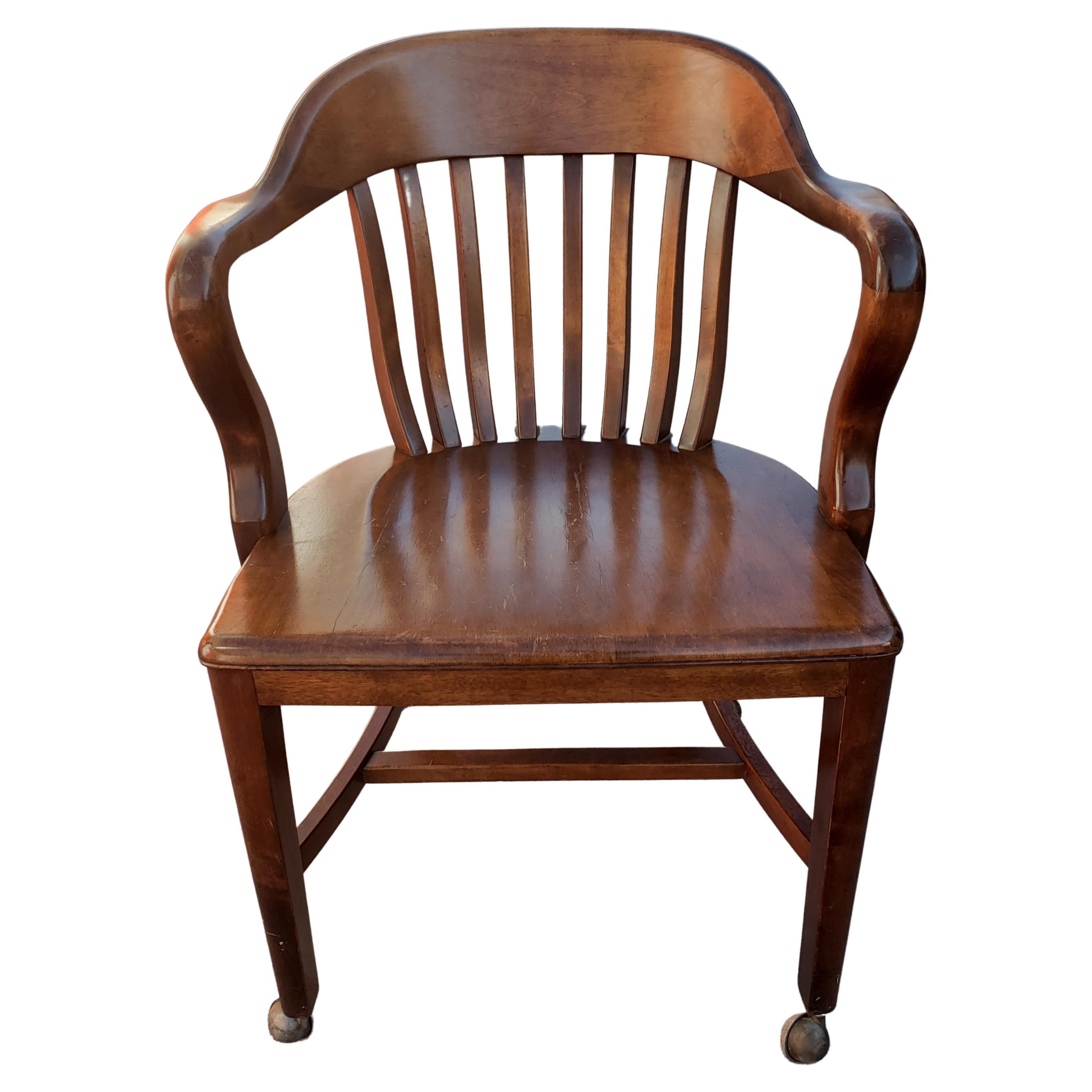 Vintage Red Oak Bankers Chair on Casters