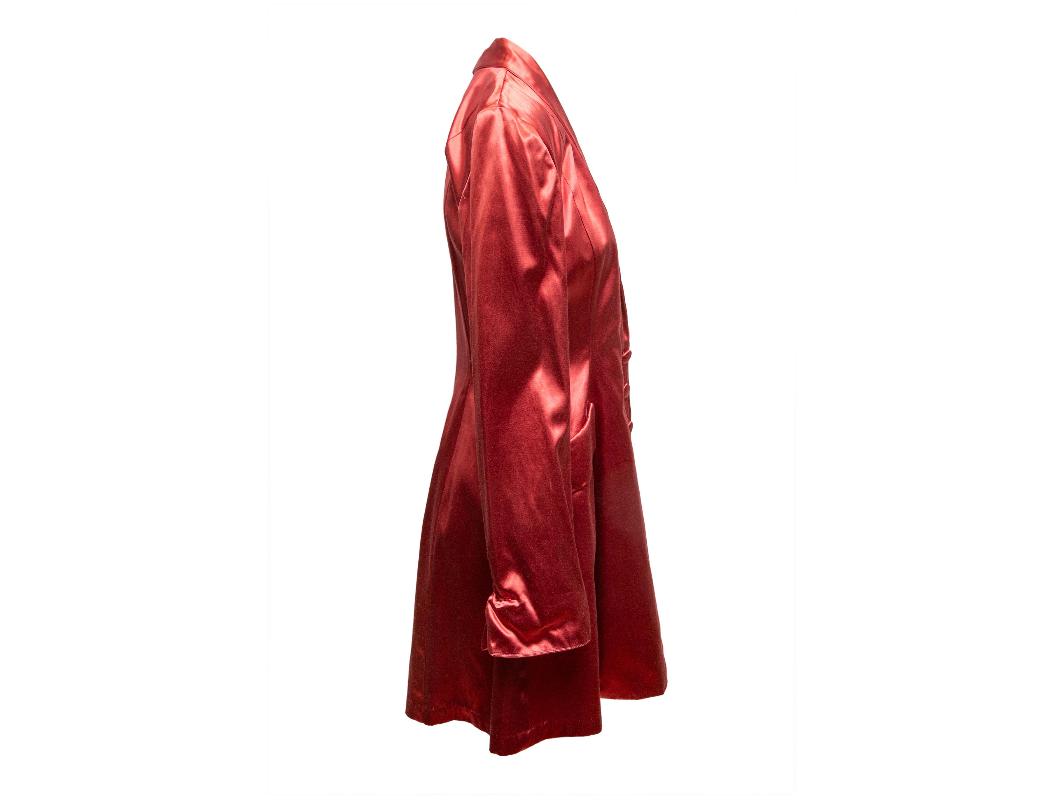  Vintage red satin longline jacket by Omo Norma Kamali. Shawl collar. Dual hip pockets. Front button closures. 34