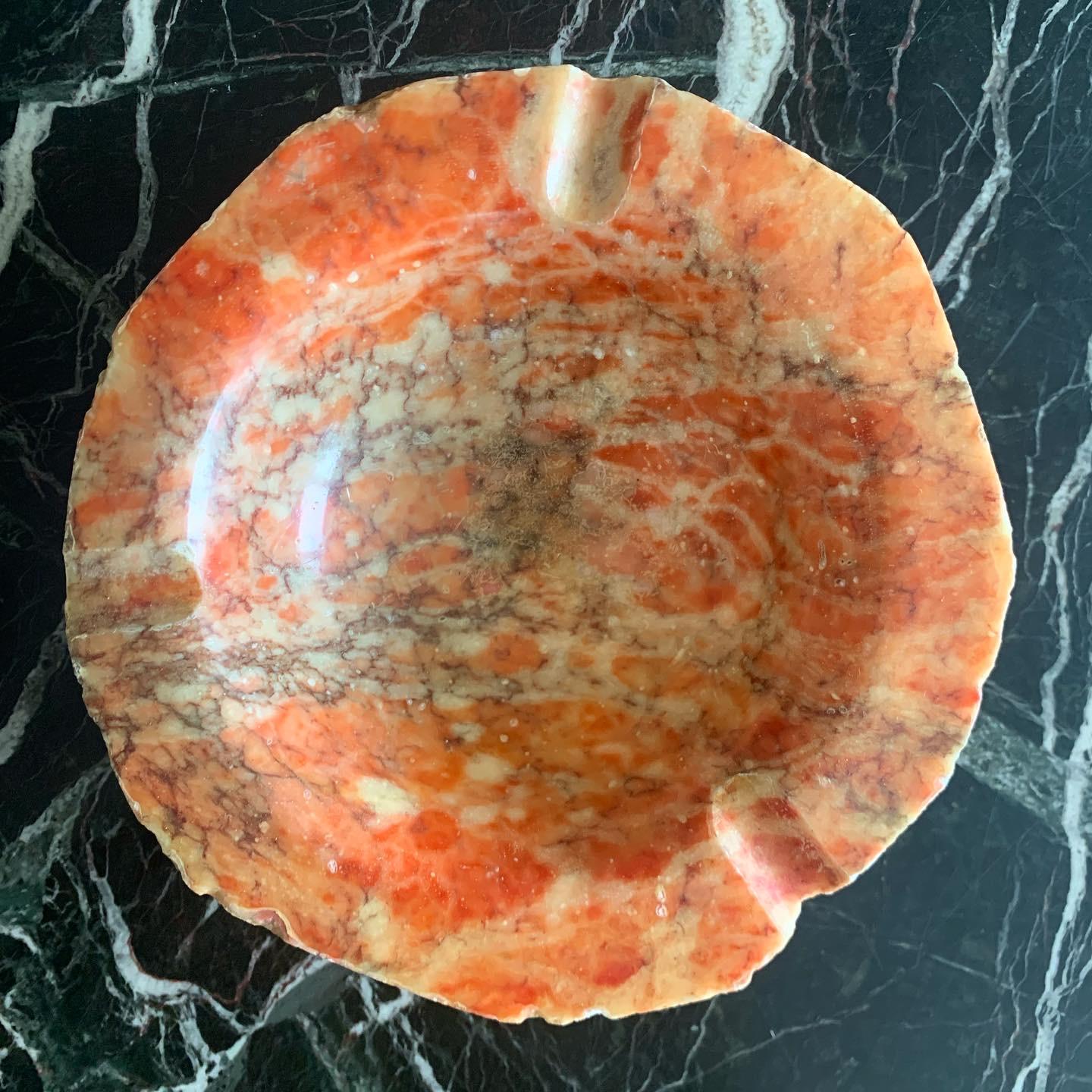 vintage Italian orange and coral red thick marble ashtray / catchall. Raw chiseled edge. Fab condition.
Measures: 7” diameter X 2.5” tall.