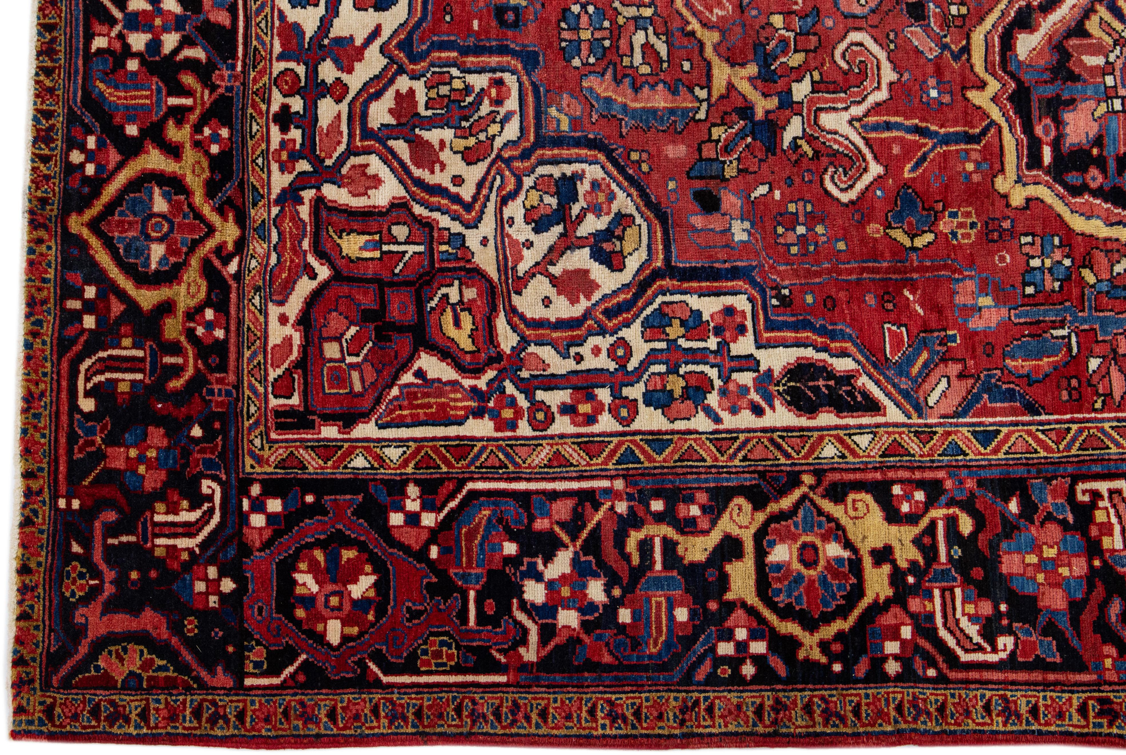 Vintage Red Persian Heriz Handmade Wool Rug with Medallion Motif In Good Condition For Sale In Norwalk, CT