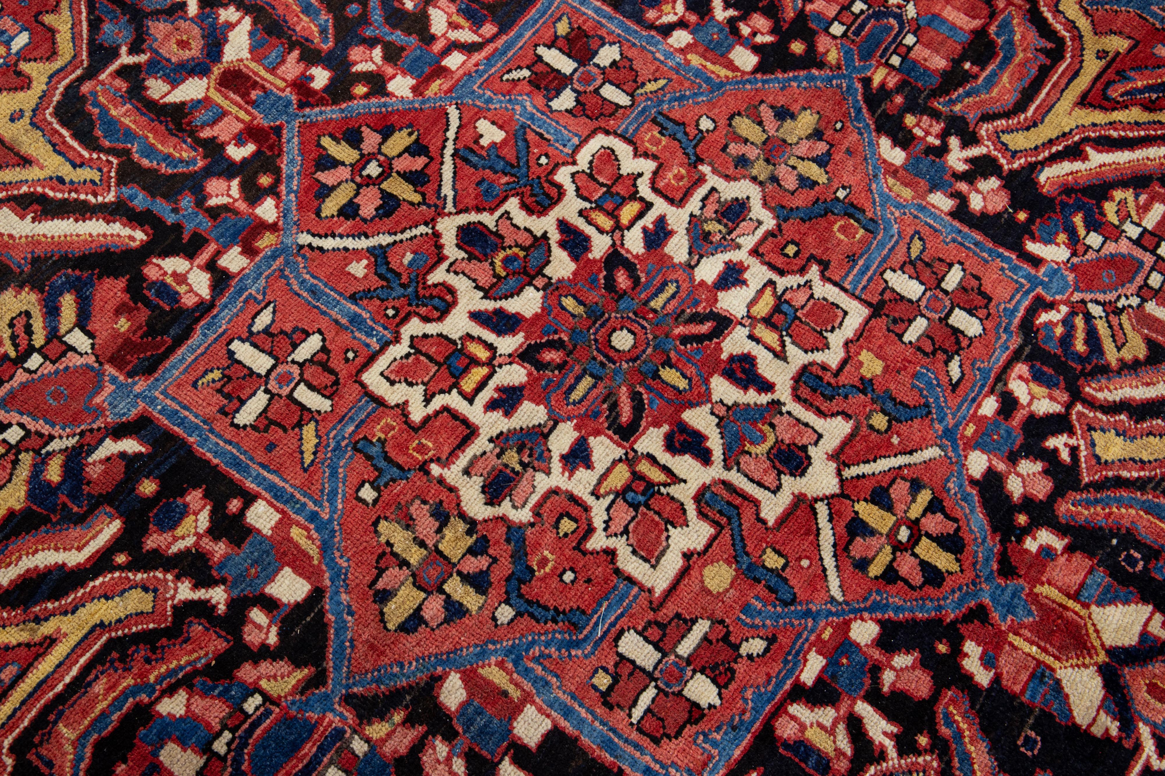 Mid-20th Century Vintage Red Persian Heriz Handmade Wool Rug with Medallion Motif For Sale