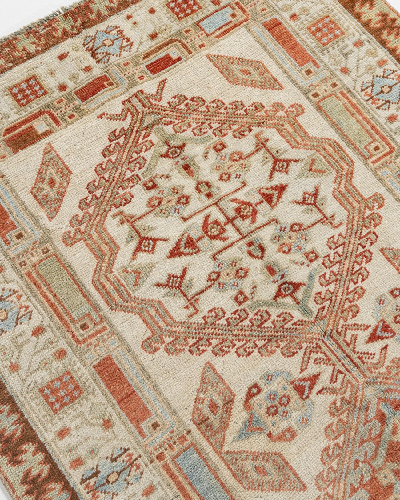 3'2 X 17'11. Serab is located on the edge of the Heriz weaving area and specializes in runners. Camel borders are standard on antique Serab rugs. The patterns are geometric, the wool pile is quite dense and more modern rugs tend toward lighter