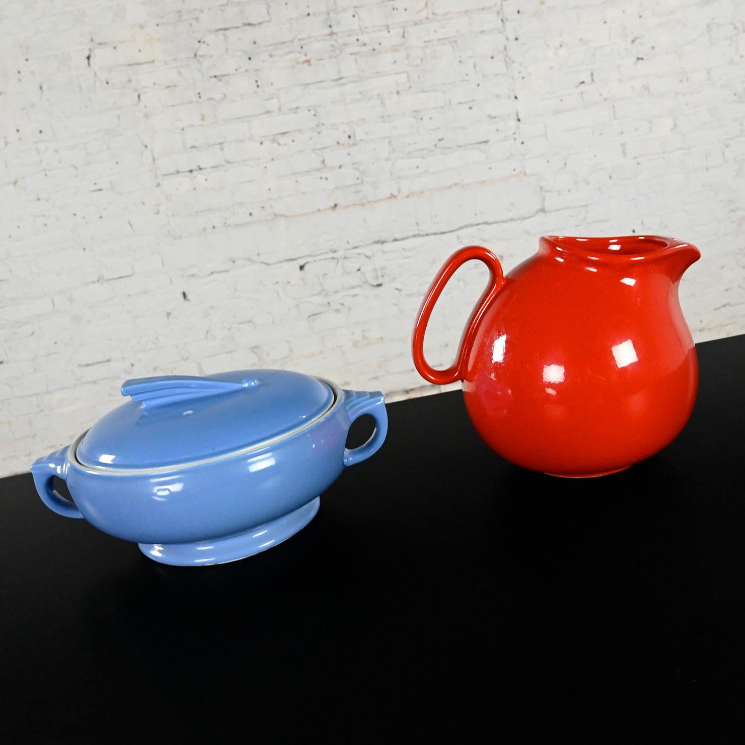 Fabulous vintage Mid-Century Modern solid colours red pitcher piece code PIT70 by Waechtersbach, Germany and a blue covered casserole “Sundial” dish by Hall. Beautiful condition, keeping in mind that these are vintage and not new so will have signs
