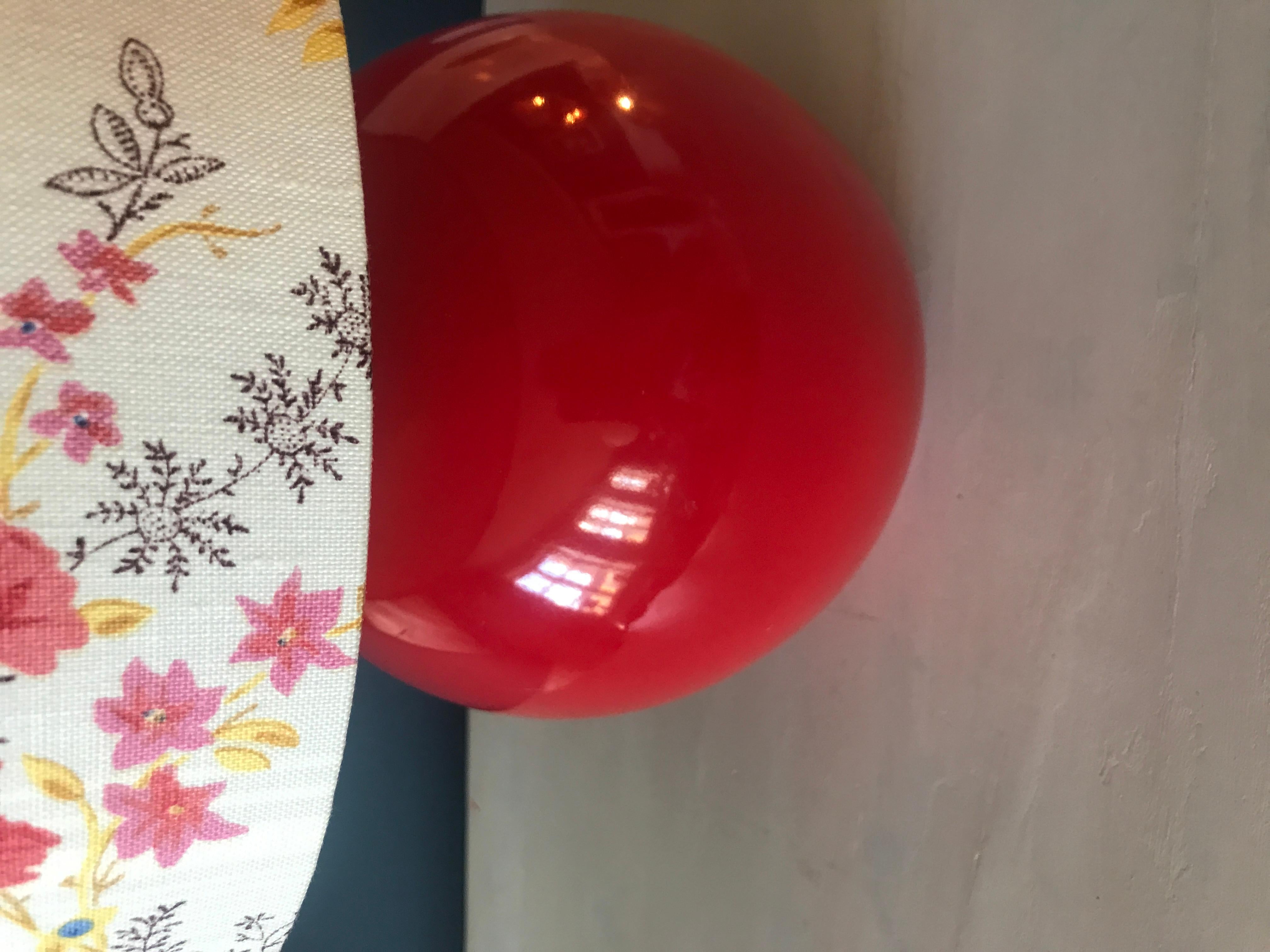 Beautiful red ceramic ball shaped table lamp.