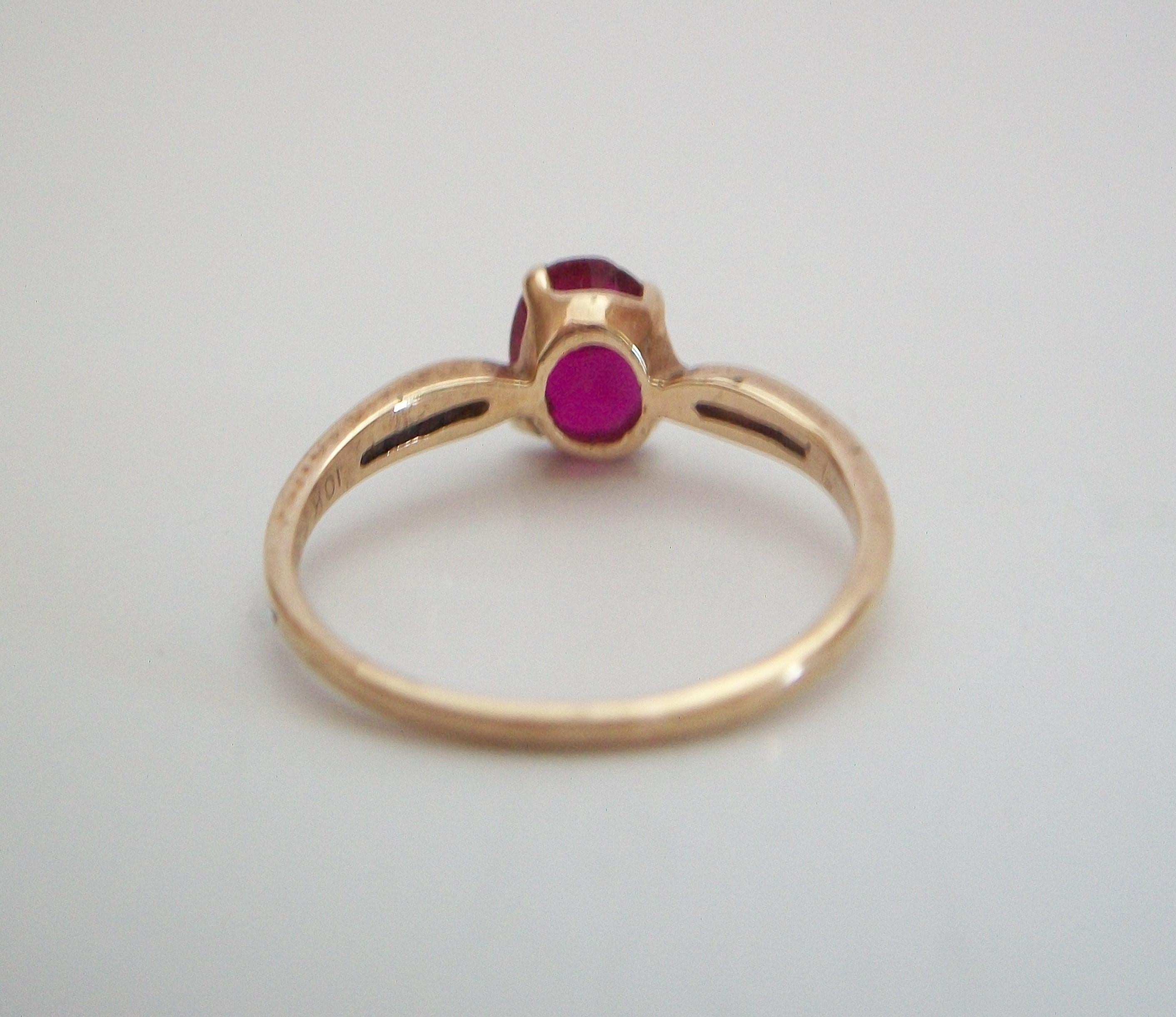 Oval Cut Vintage Red Topaz & 10K Yellow Gold Ring - Size 5.5 - U.S.A. - Circa 1980's For Sale