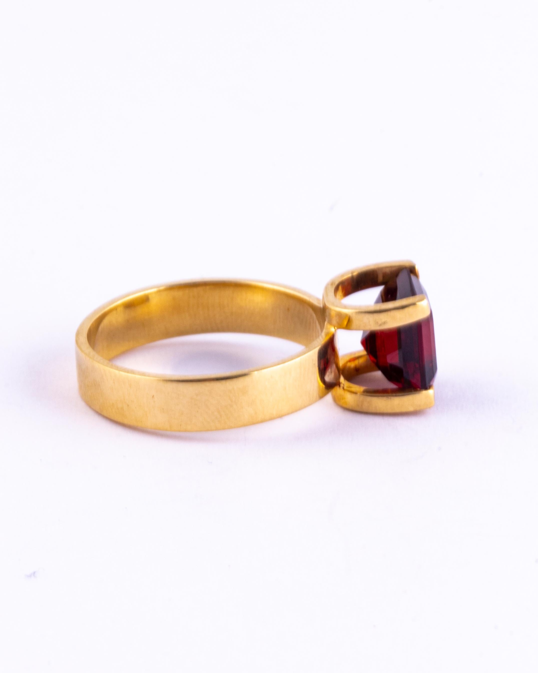This gorgeous red tourmaline has a deep colour but when it glistens in the light it has bursts of bright red that reflect! Perched up high and modelled in 9carat gold. 

Ring Size: O 1/2 or 7 1/2 
Stone Dimensions: 9x8mm 

Weight: 4.7g 