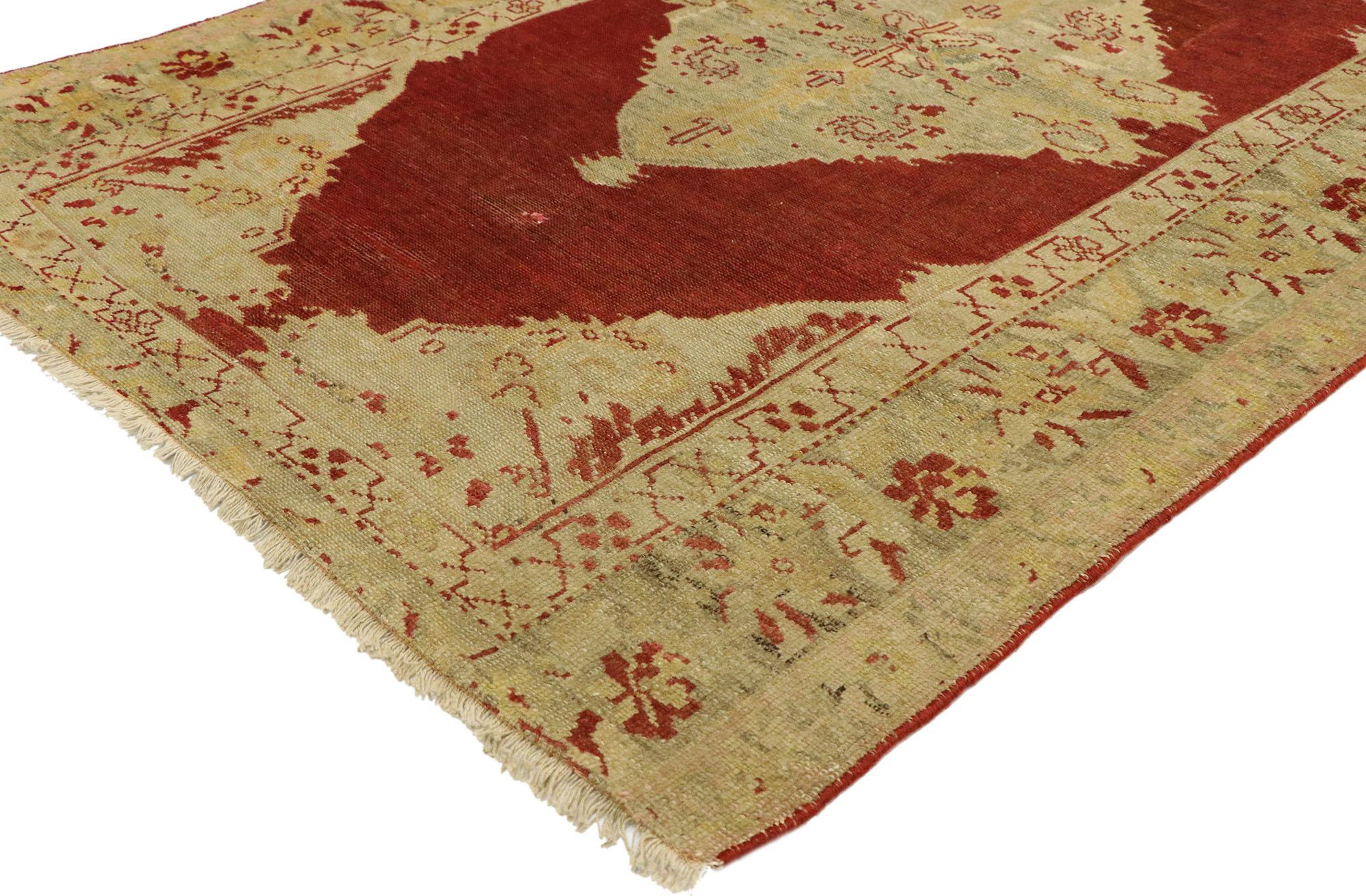 73932 Vintage Turkish Oushak Rug, 03'06 x 05'04. Step into a realm where Anatolian history and refined artistry intertwine, weaving elegance and charm into this hand knotted wool vintage Turkish Oushak rug. Picture a lavish expanse of open red, a