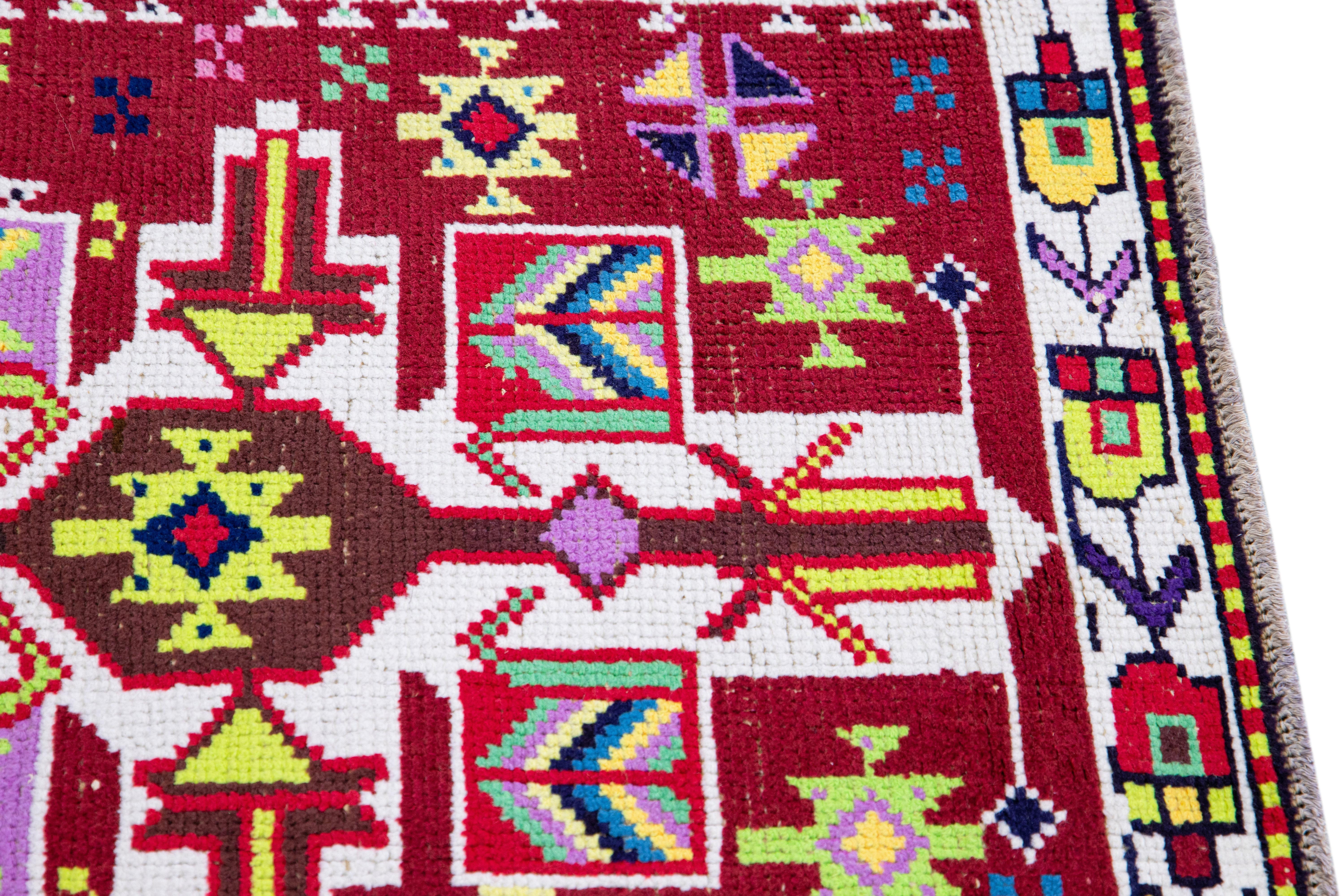 20th Century Vintage Red Turkish Handmade Multicolor Geometric Pattern Wool Runner For Sale
