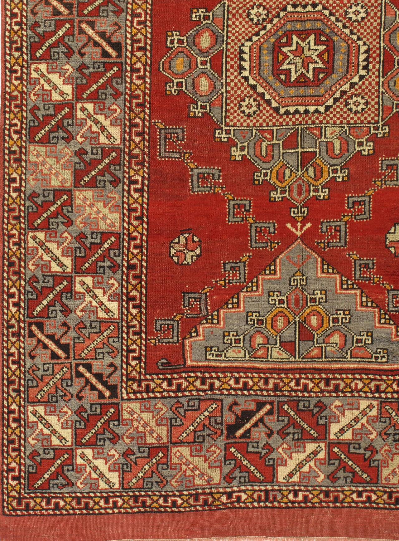 Vintage Turkish Oushak rug, circa 1940. Handwoven in Turkey where rug weaving is the culture rather than a business. Rugs from Oushak are known for the high quality of their wool their beautiful patterns and warm colors. These designer favourites