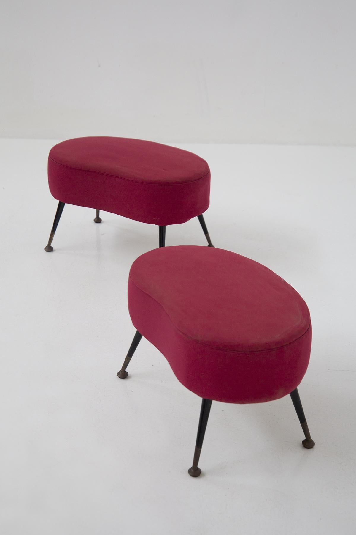 Gorgeous pair of velvet poufs designed in the 1950s by fine Italian manufacture.
The pouffs have a frame made of black aluminum, with round brass feet in patina.
There are 4 legs and they are slightly flared to allow for stability.
The seat, on