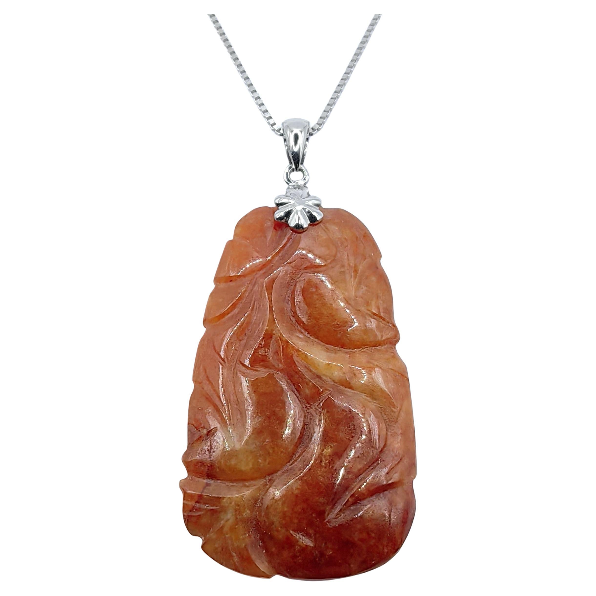 What does orange jade symbolize?