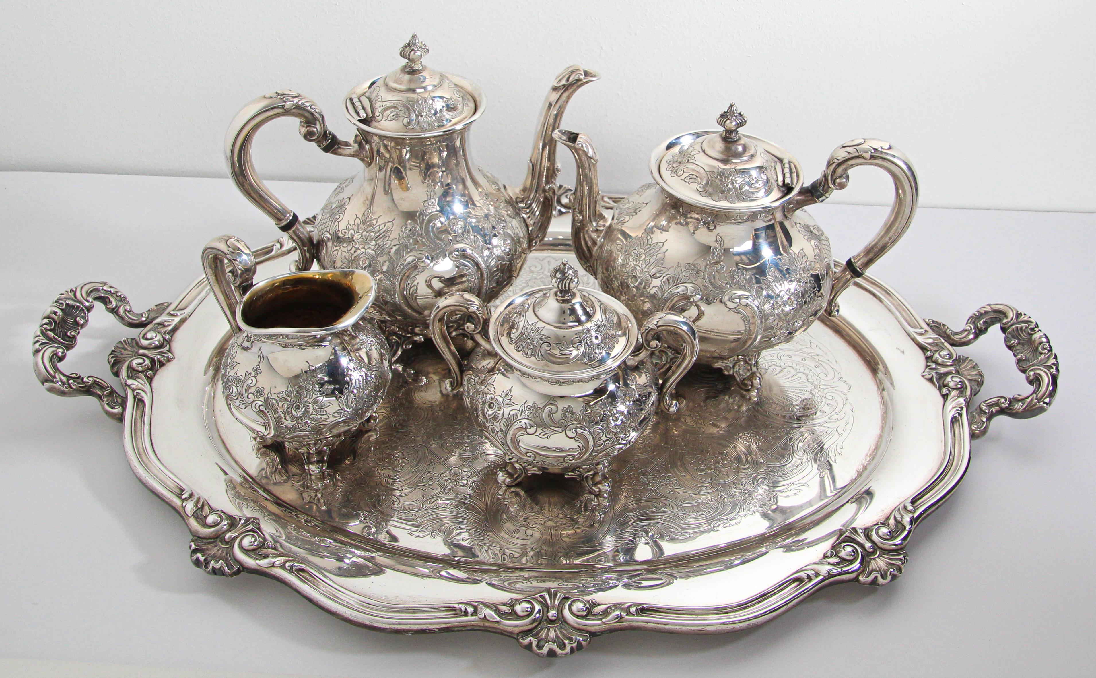 Complete vintage Reed & Barton Regent Hand Chased silverplate pattern 5600C tea and coffee silver plated service set with tray.
This is an absolutely gorgeous silverplate tea set consisting of a teapot, and sugar and creamer. These hand-chased