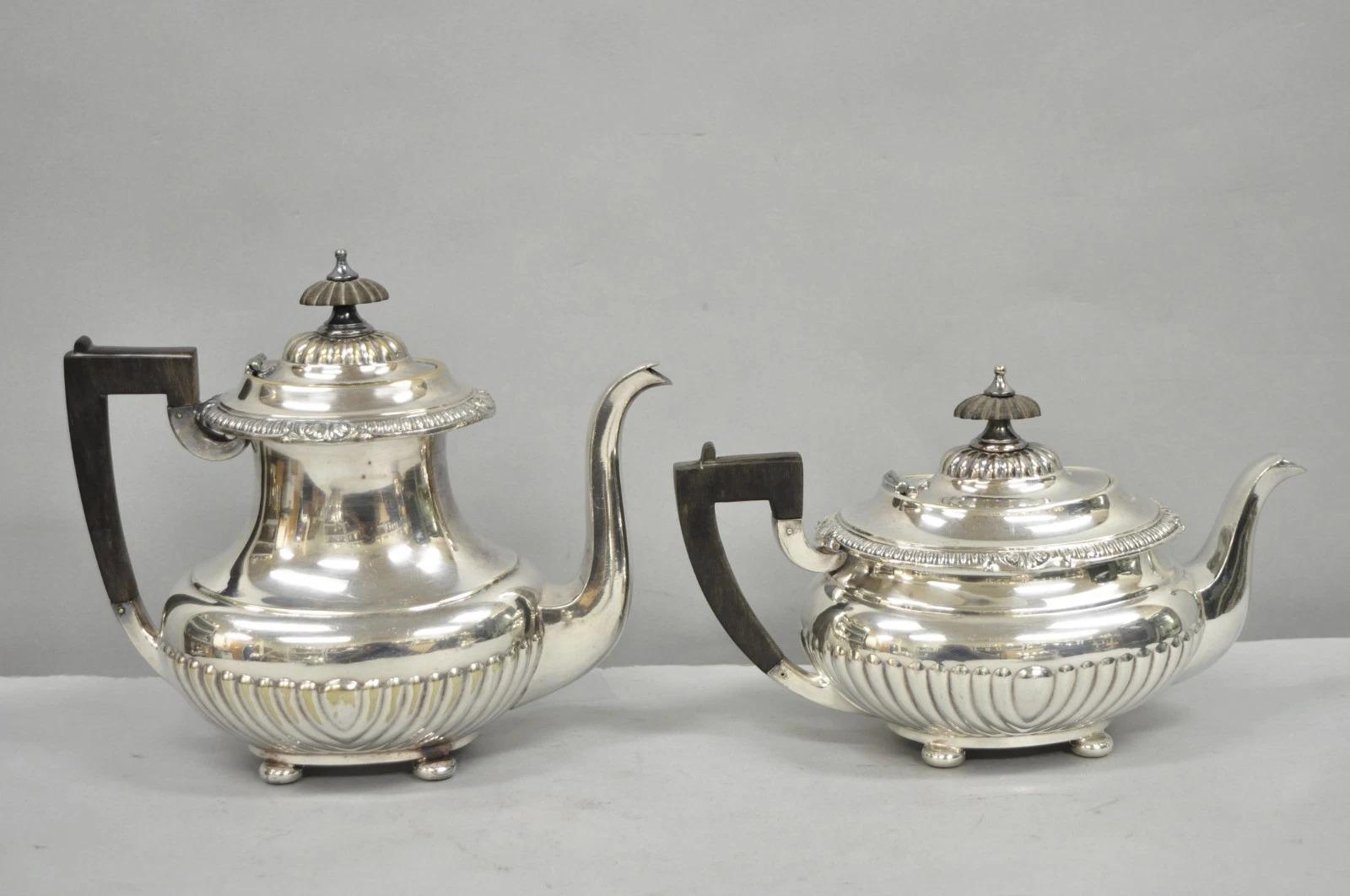 Vintage Reed & Barton Sulgrave Manor Edwardian Silver Plated Tea Set - 4 Pc Set. Listing includes (1) coffee pot, (1) tea kettle (1) lidded sugar bowl, (1) creamer. Circa Early 20th Century. Measurements: Largest piece: 8.5