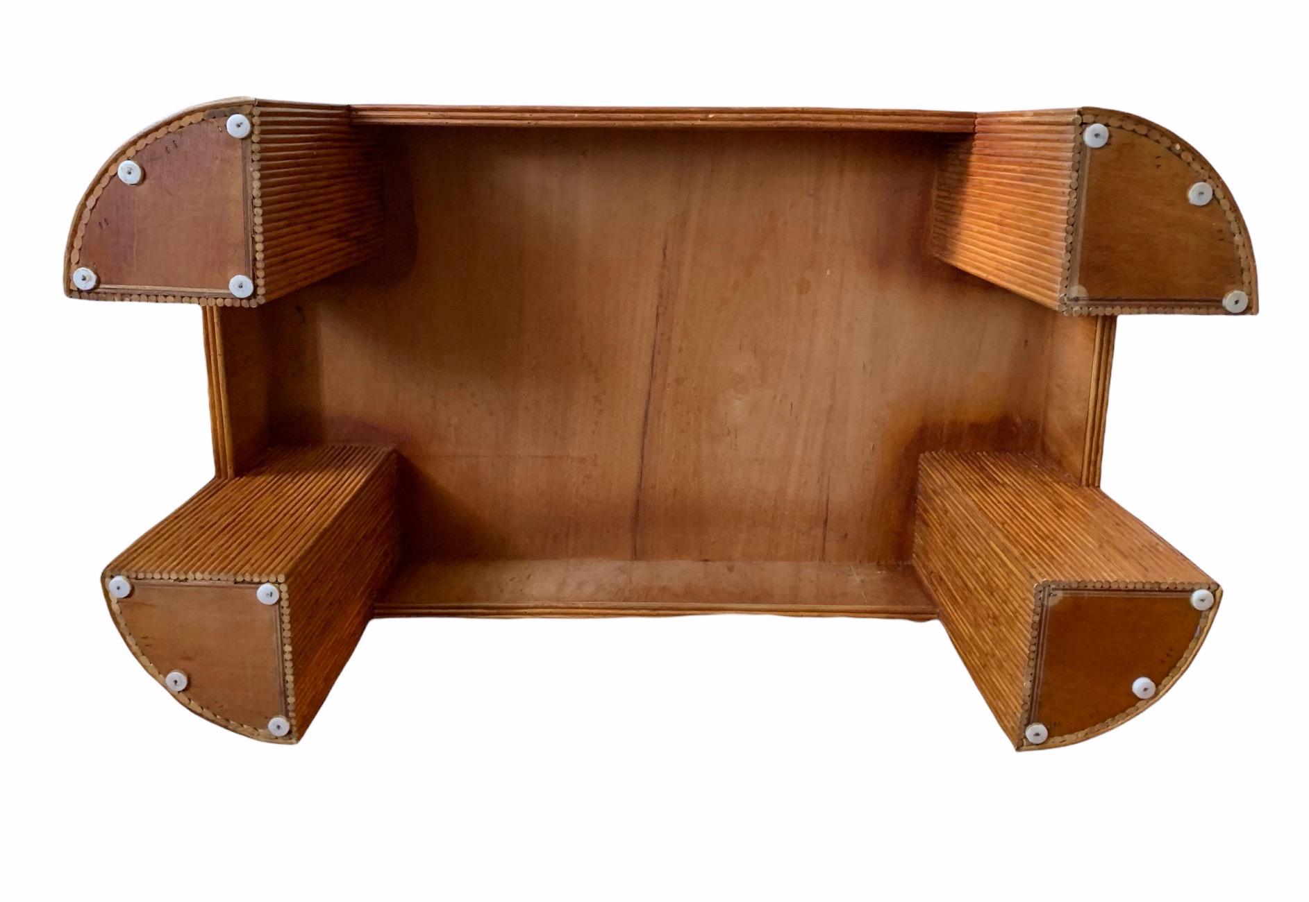 This table is a solid piece of furniture that can easily withstand whatever amount of weight you wish to test it with (multiple beverages, heavy books, your children...)

The finish displays a wonderful warmth and depth.

It sports a glass top