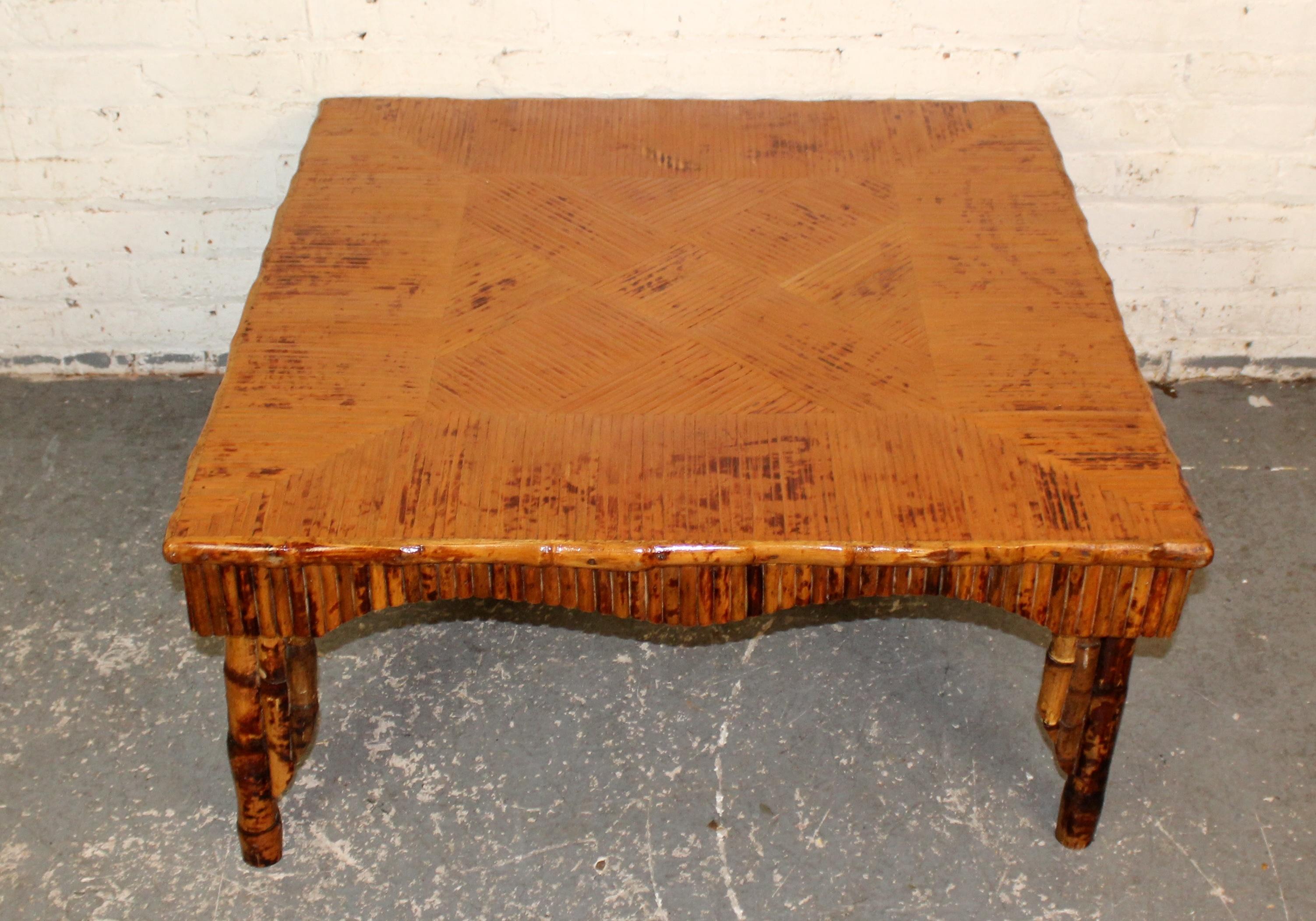 A charming vintage bamboo coffee table in the style of Western design legend Thomas Molesworth. Featuring a rustic yet refined aesthetic, this piece combines natural bamboo poles with a sturdy, handcrafted frame that reflects the rugged elegance of