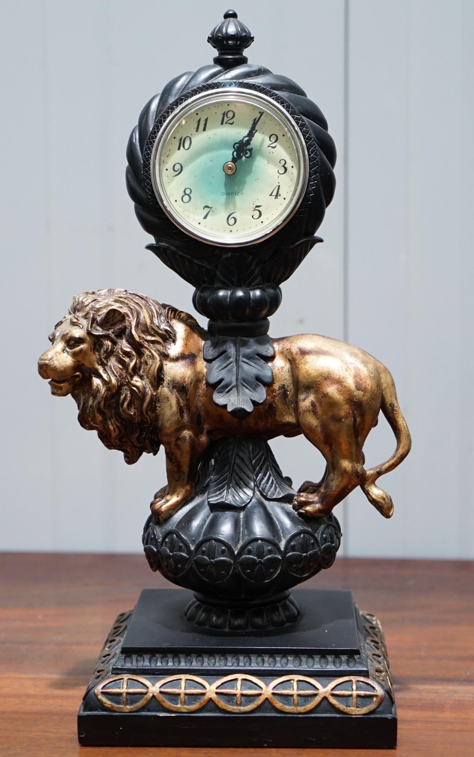 We are delighted to offer for sale this nice decorative mantle clock of a very regal looking Lion 

A very lovely ornate clock, the movement is a modern digital piece 

There's a lot of high-end detail with this clock as you can see

This